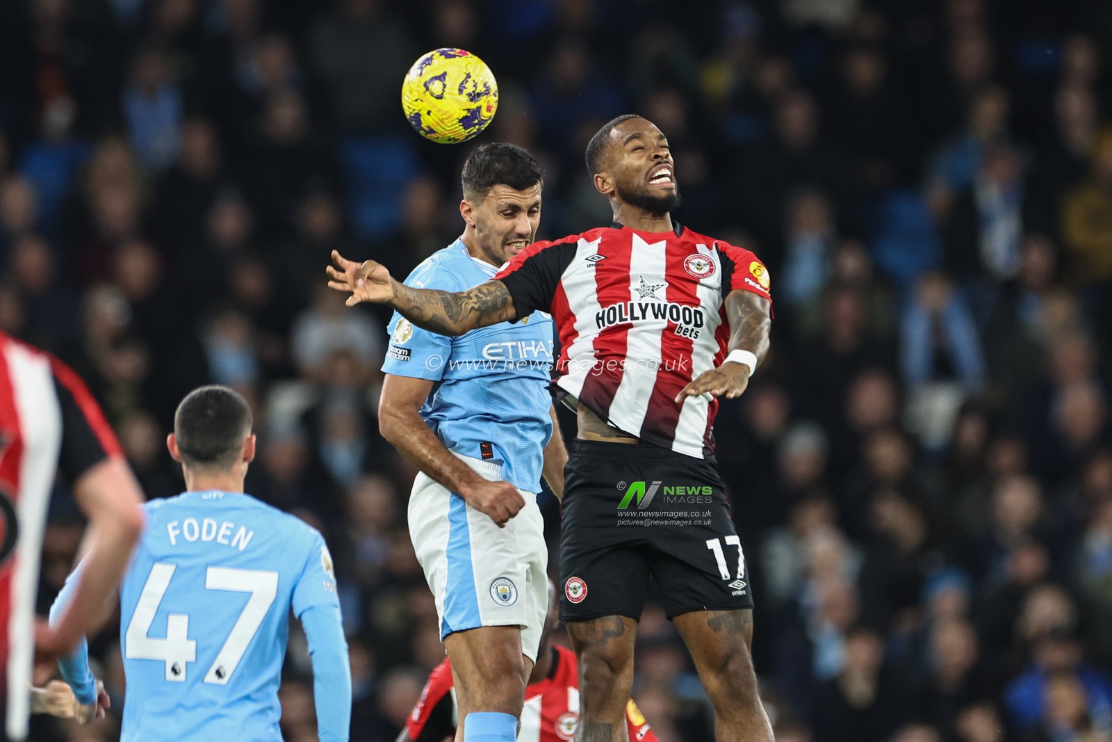 Rodri of Manchester City and Ivan Toney of Brentford battle for the ball during the Premier League match Manchester City vs Brentford at Etihad Stadium, Manchester, United Kingdom, 20th February 2024

(Photo by Mark Cosgrove/News Images)