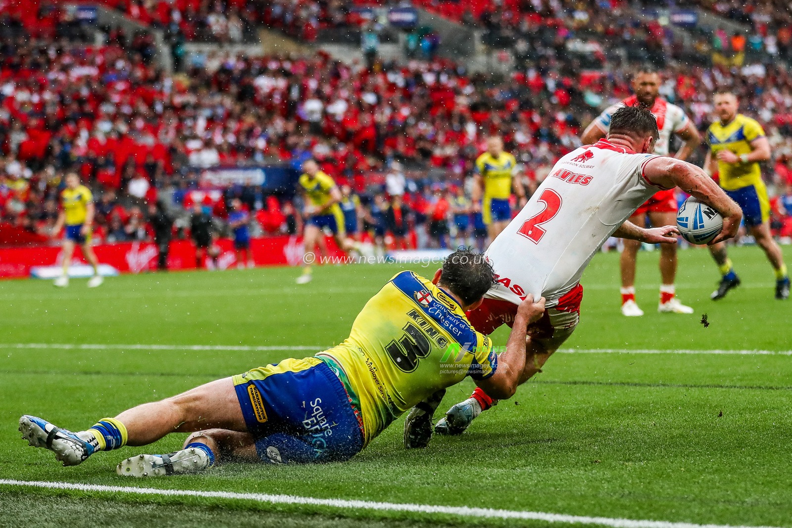 Toby King of Warrington Wolves makes a tackle during the Betfred Challenge Cup Final Warrington Wolves vs Hull KR at Wembley Stadium, London, United Kingdom, 7th June 2025

(Photo by Izzy Poles/News Images)