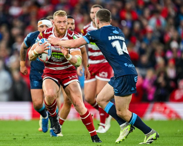 Luke Thompson of Wigan Warriors breaks with the ball during the Betfred Super League Grand Final match Wigan Warriors vs Hull KR at Old Trafford, Manchester, United Kingdom, 12th October 2024

(Photo by Craig Thomas/News Images)