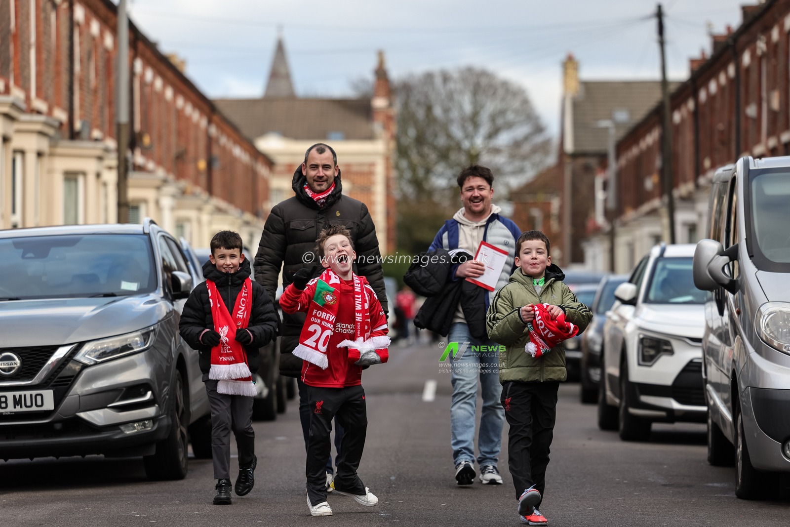 Liverpool fans make their way to Anfield during the Premier League match Liverpool vs Wolverhampton Wanderers at Anfield, Liverpool, United Kingdom, 27th December 2025

(Photo by Mark Cosgrove/News Images)

*** GER AUT SUI OUT ***