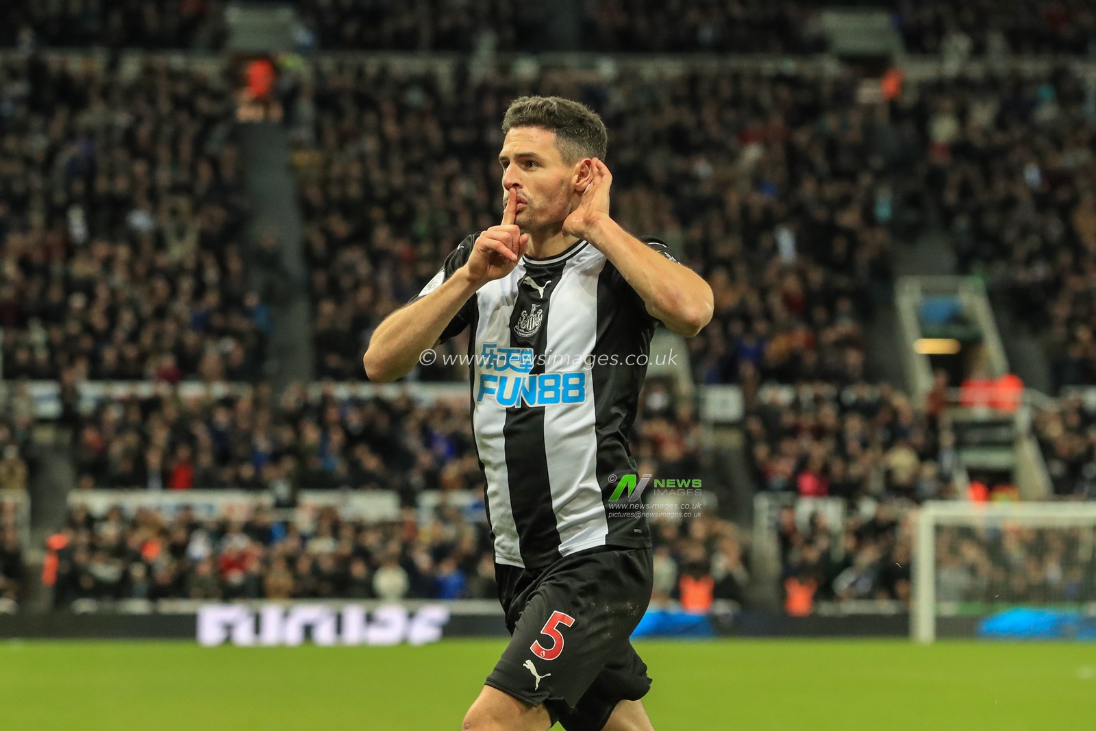 28th December 2019, St. James's Park, Newcastle, England; Premier League, Newcastle United v Everton : Fabian Schar (5) of Newcastle United celebrates his goal to make it 1-1

Credit: Mark Cosgrove/News Images