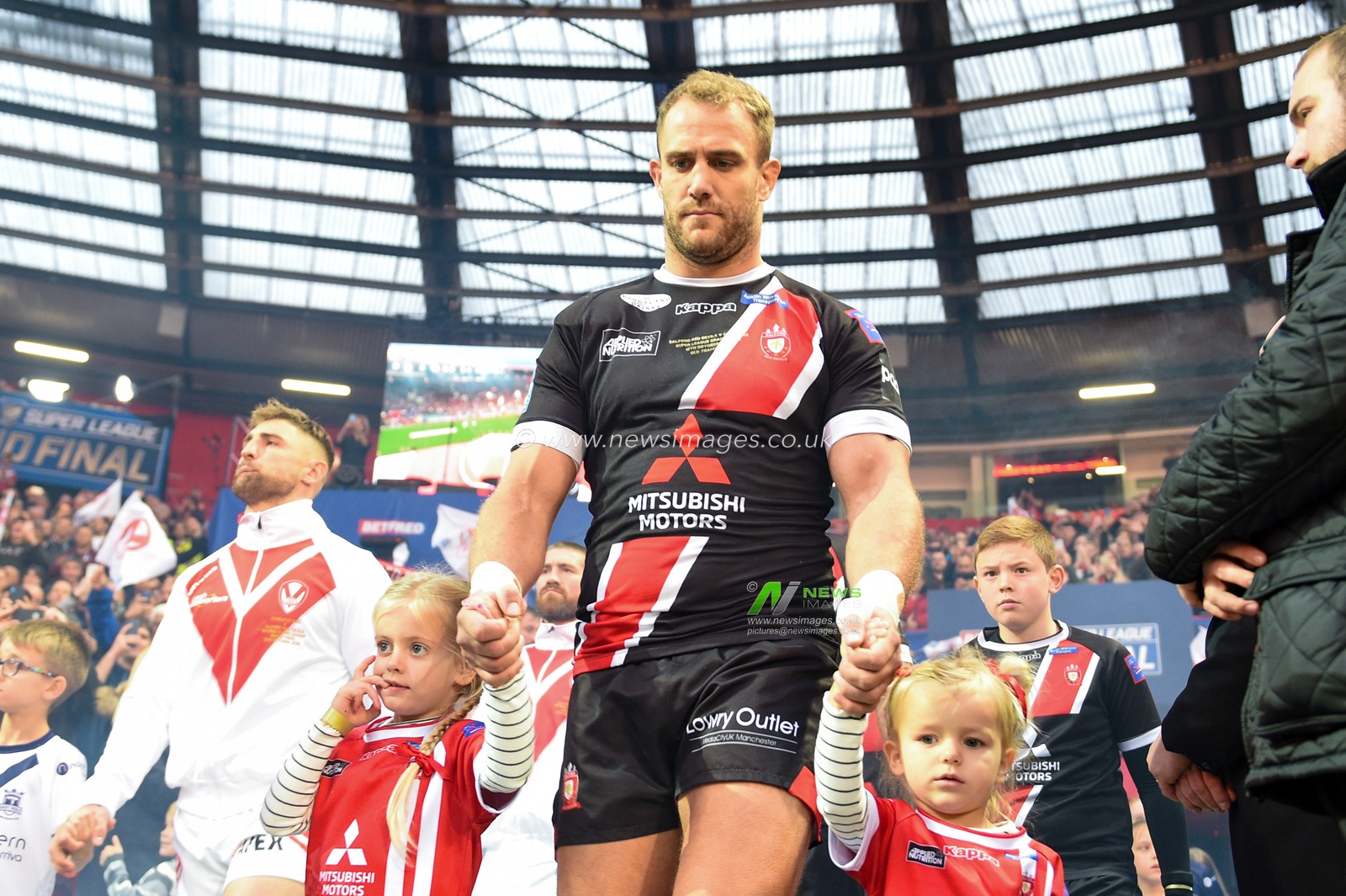 12th October 2019, Old Trafford, Manchester, England; The Grand Final 2019, Saint Helens v Salford Red Devils : Lee Mossop (8) of Salford Red Devils leads out his team as captain

Credit: Richard Long/News Images
