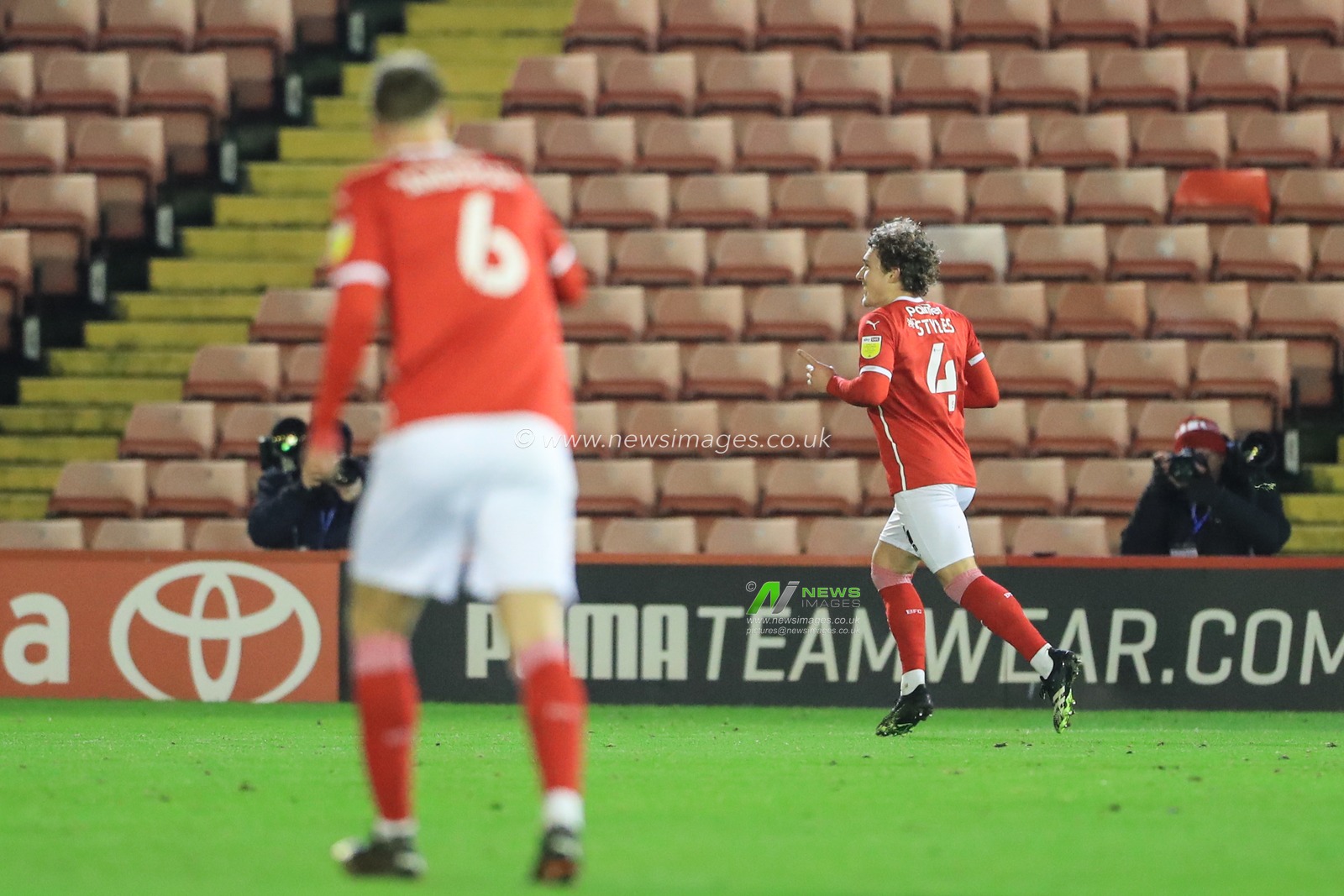 celebration Callum Styles #4 of Barnsley celebrates his goal to make it 1-0