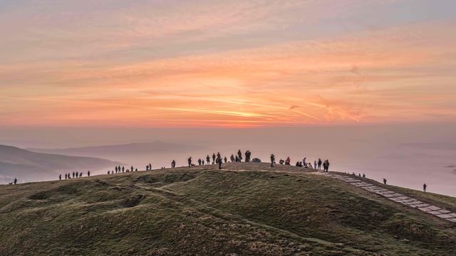 Sunrise hikers walk to the summit of Mam Tor as they watch the sunrise and admire the cloud inversion in the Hope Valley at Mam Tor in the Peak District at Mam Tor, Castleton, United Kingdom on 21 March 2026

(Photo by Mark Cosgrove/News Images)