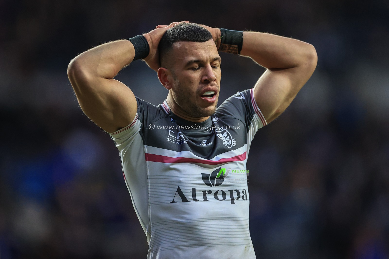 A dejectednCarlos Tuimavave of Hull FC during the game