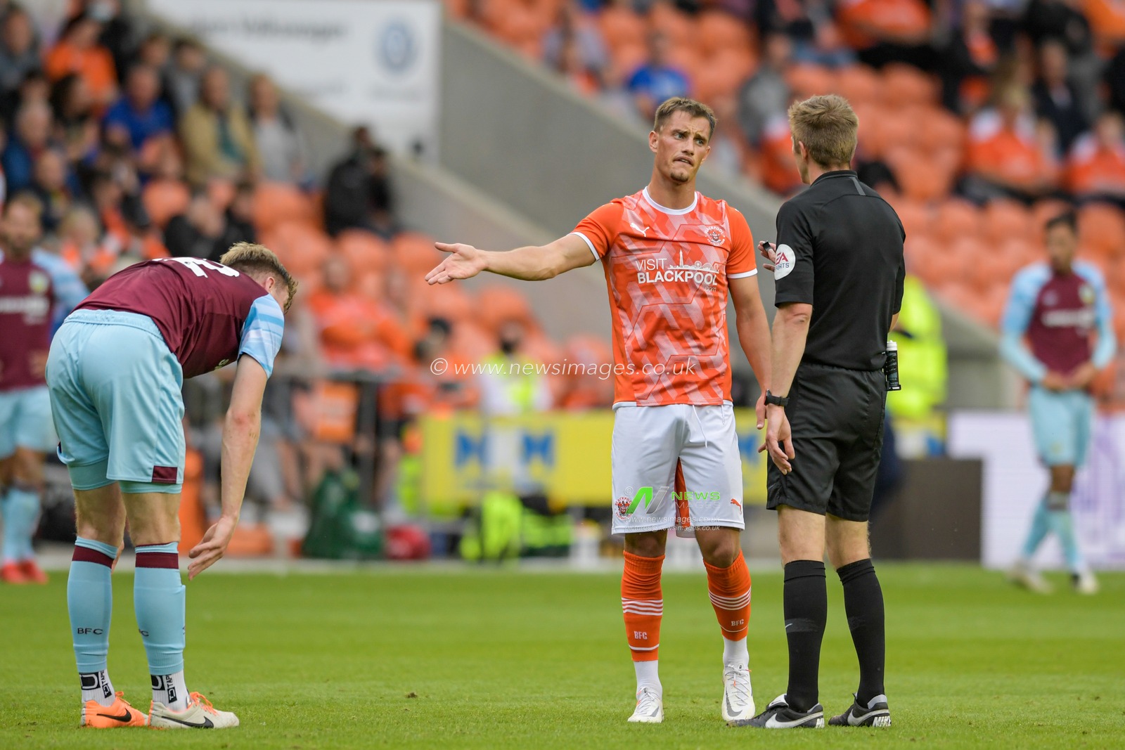 Jerry Yates #9 of Blackpool speaks to the referee