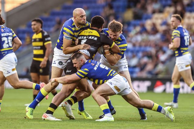 Toa Mata'afa of York Knights is tackled by James Harrison of Warrington Wolves, Luke Thomas of Warrington Wolves and Danny Walker of Warrington Wolves during the Betfred Super League round 23 match Warrington Wolves vs York Knights at The Halliwell Jones Stadium, Warrington, United Kingdom on 13 August 2026

(Photo by Alfie Cosgrove/News Images)
