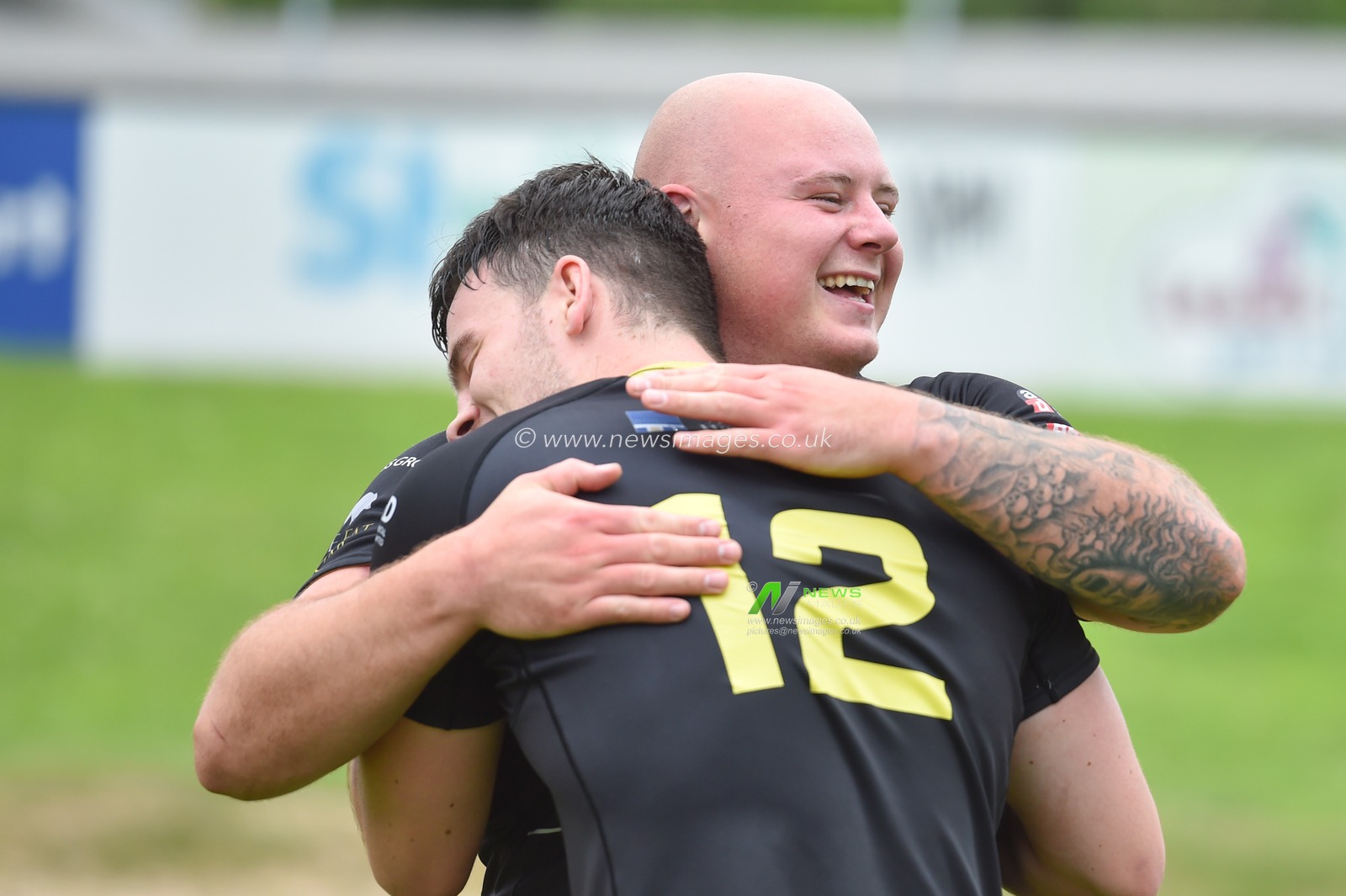 Brad Brennan of North Wales Crusaders celebrates with Alex Eckley of North Wales Crusaders