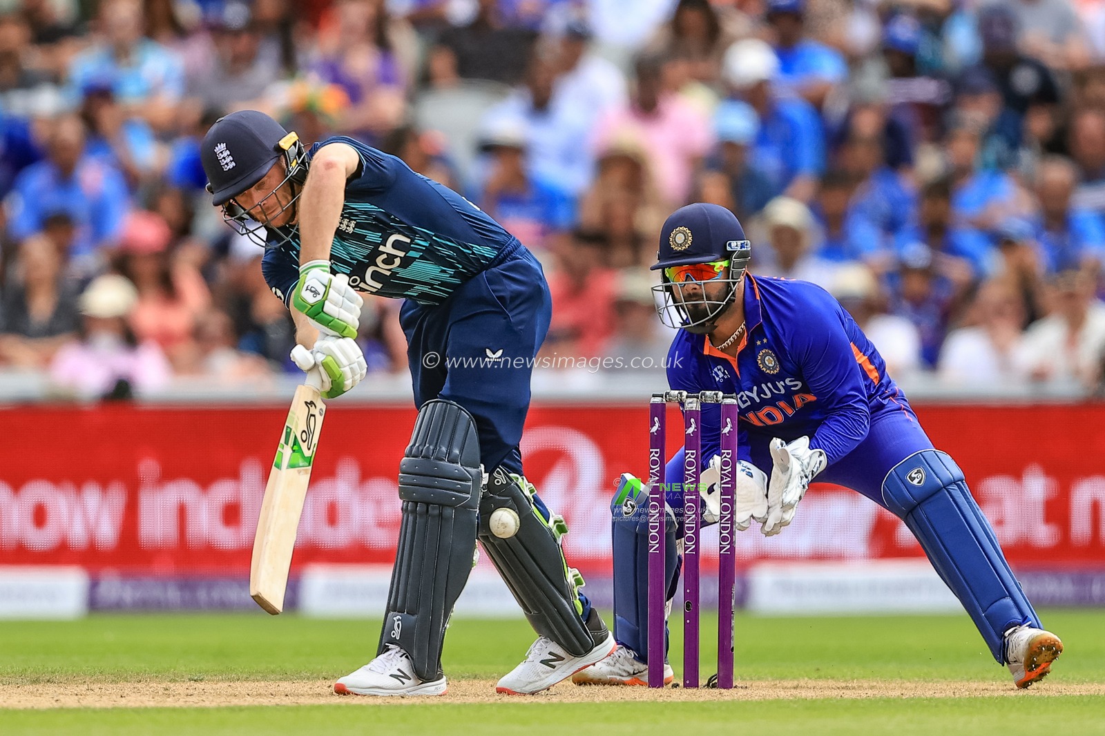 Jos Buttler of England hits the ball for one run