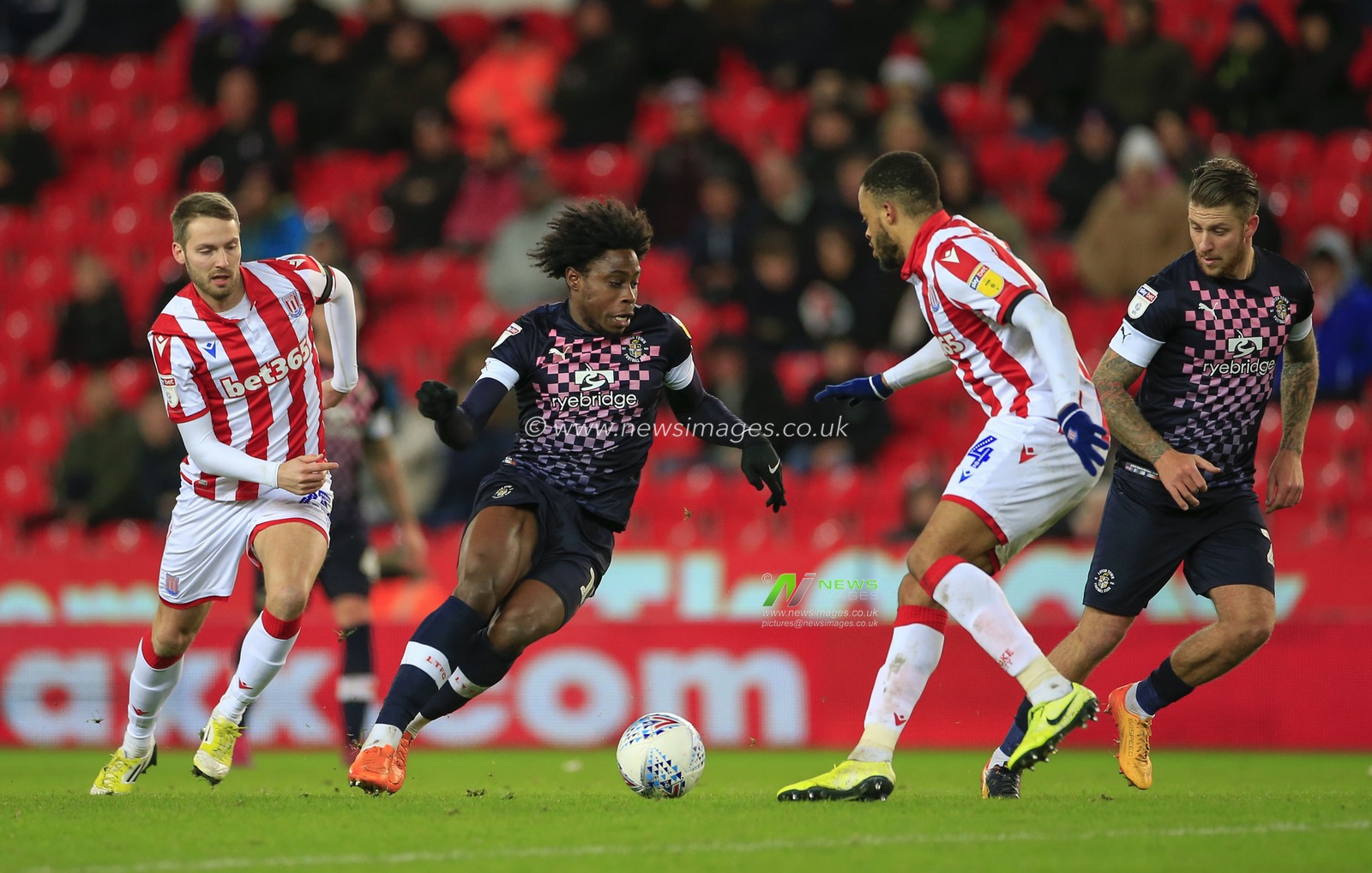 10th December 2019, Bet365 Stadium, Stoke-on-Trent, England; Sky Bet Championship, Stoke City v Luton Town : Pelly Ruddock (17) of Luton Town tries to get past Jordan Cousins (24) of Stoke City

Credit: Conor Molloy/News Images