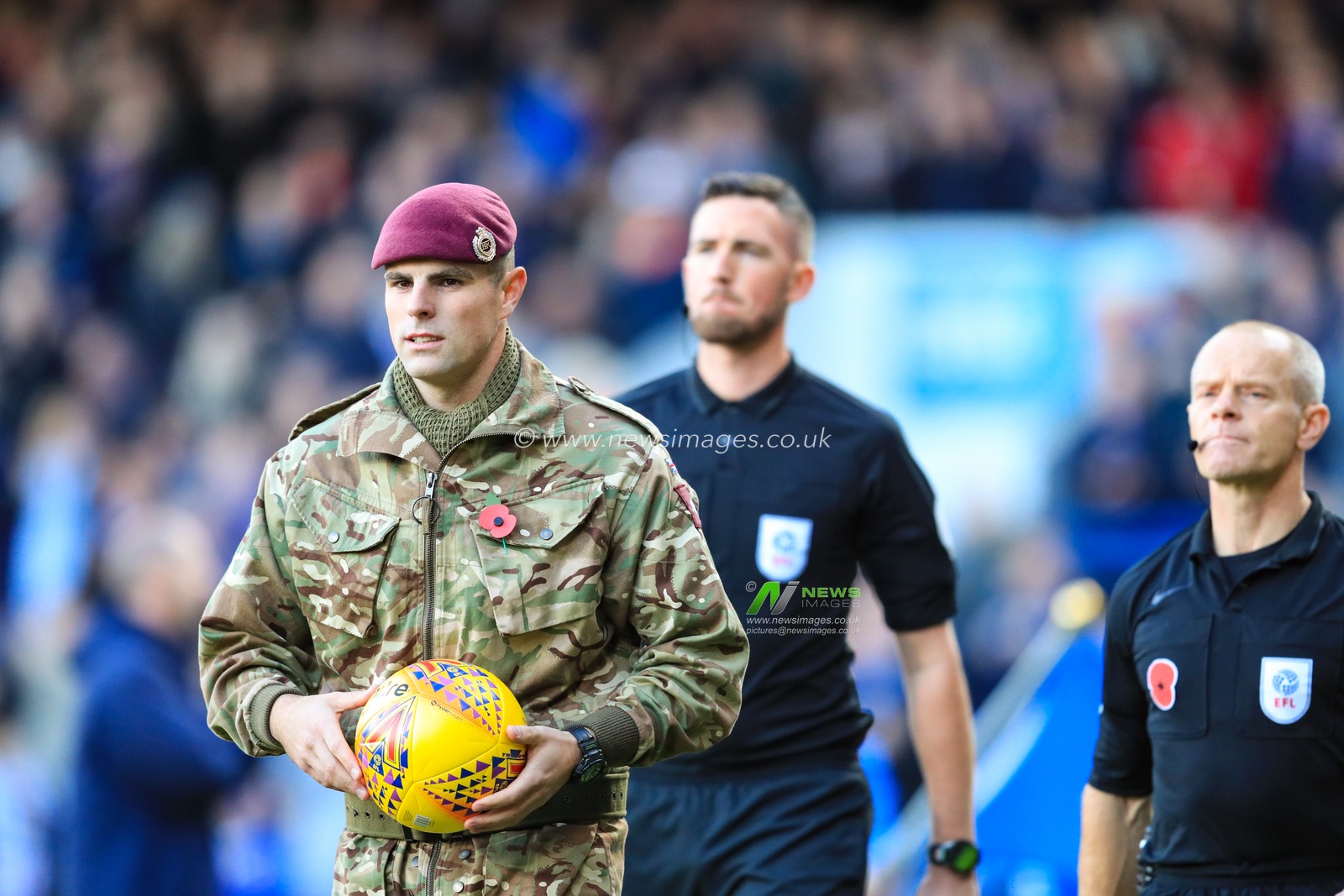 3rd November 2018, Portman Road, Ipswich, England; Sky Bet Championship Preston North End  ; A member of the armed forces carries the match ball ahead of remembrance day.

Credit: Georgie Kerr/News Images,

English Football League images are subject to DataCo Licence