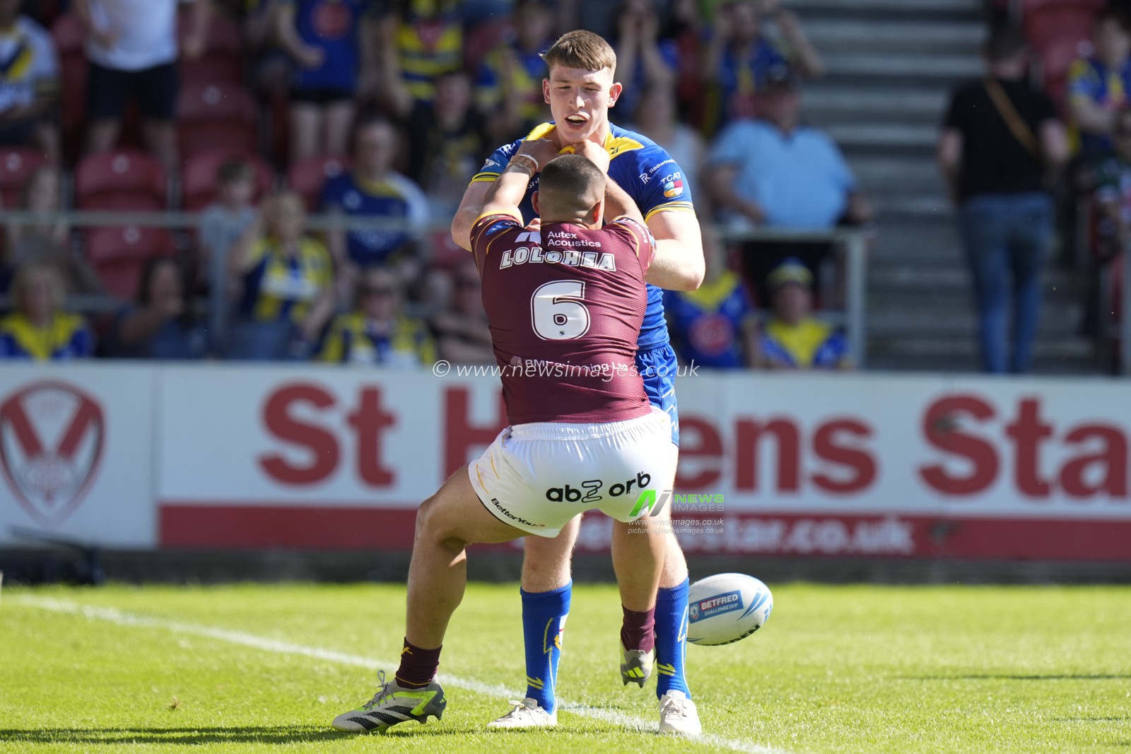 Tui Lolohea of Huddersfield Giants gets into an altercation with Matty Nicholson of Warrington Wolves during the Betfred Challenge Cup Semi-Final match Huddersfield Giants vs Warrington Wolves at Totally Wicked Stadium, St Helens, United Kingdom, 19th May 2024

(Photo by Steve Flynn/News Images)