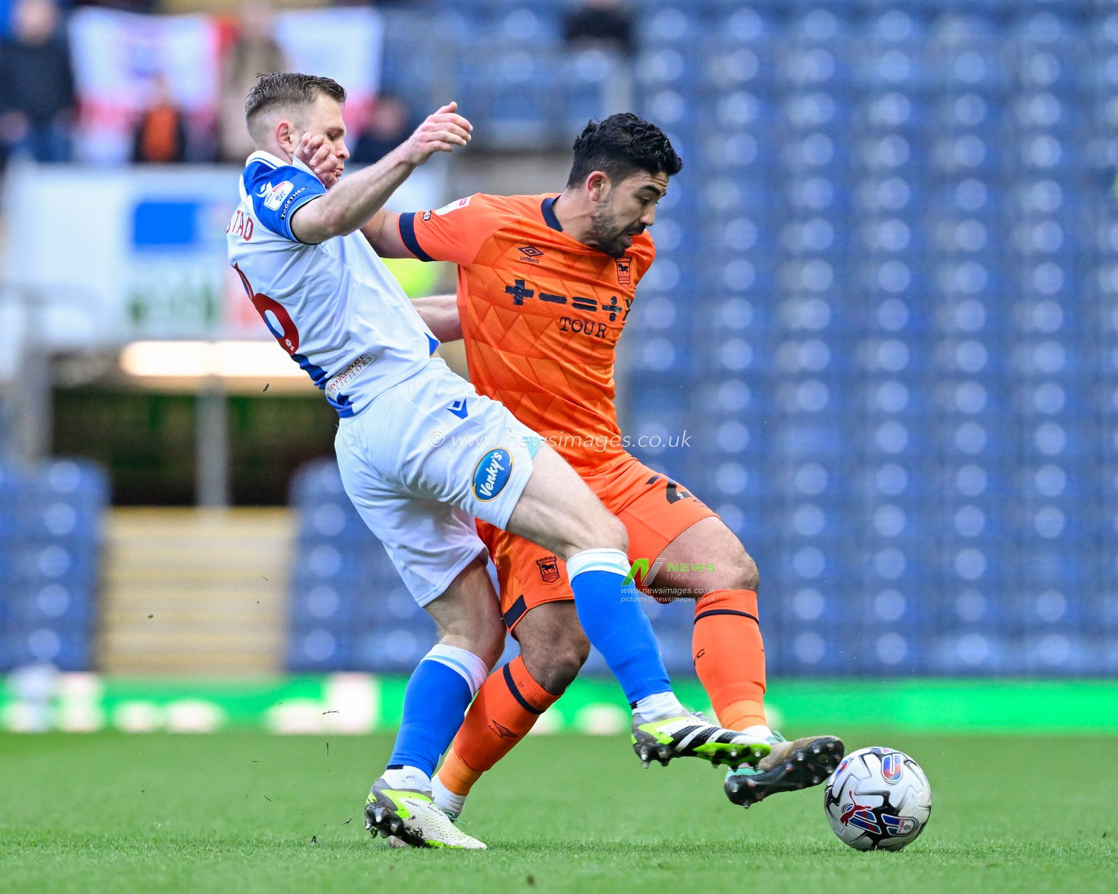Massimo Luongo  of Ipswich Town and Scott Wharton of Blackburn Rovers battle for the ball, during the Sky Bet Championship match Blackburn Rovers vs Ipswich Town at Ewood Park, Blackburn, United Kingdom, 29th March 2024

(Photo by Cody Froggatt/News Images)