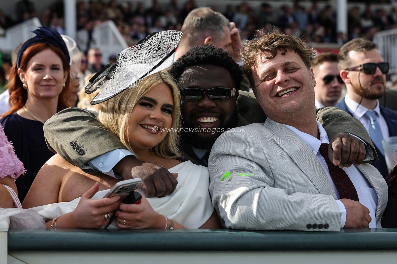 Racegoers on the finish line during the 2026 Randox Grand National Day at Aintree Racecourse, Aintree, United Kingdom on 11 April 2026

(Photo by Mark Cosgrove/News Images)