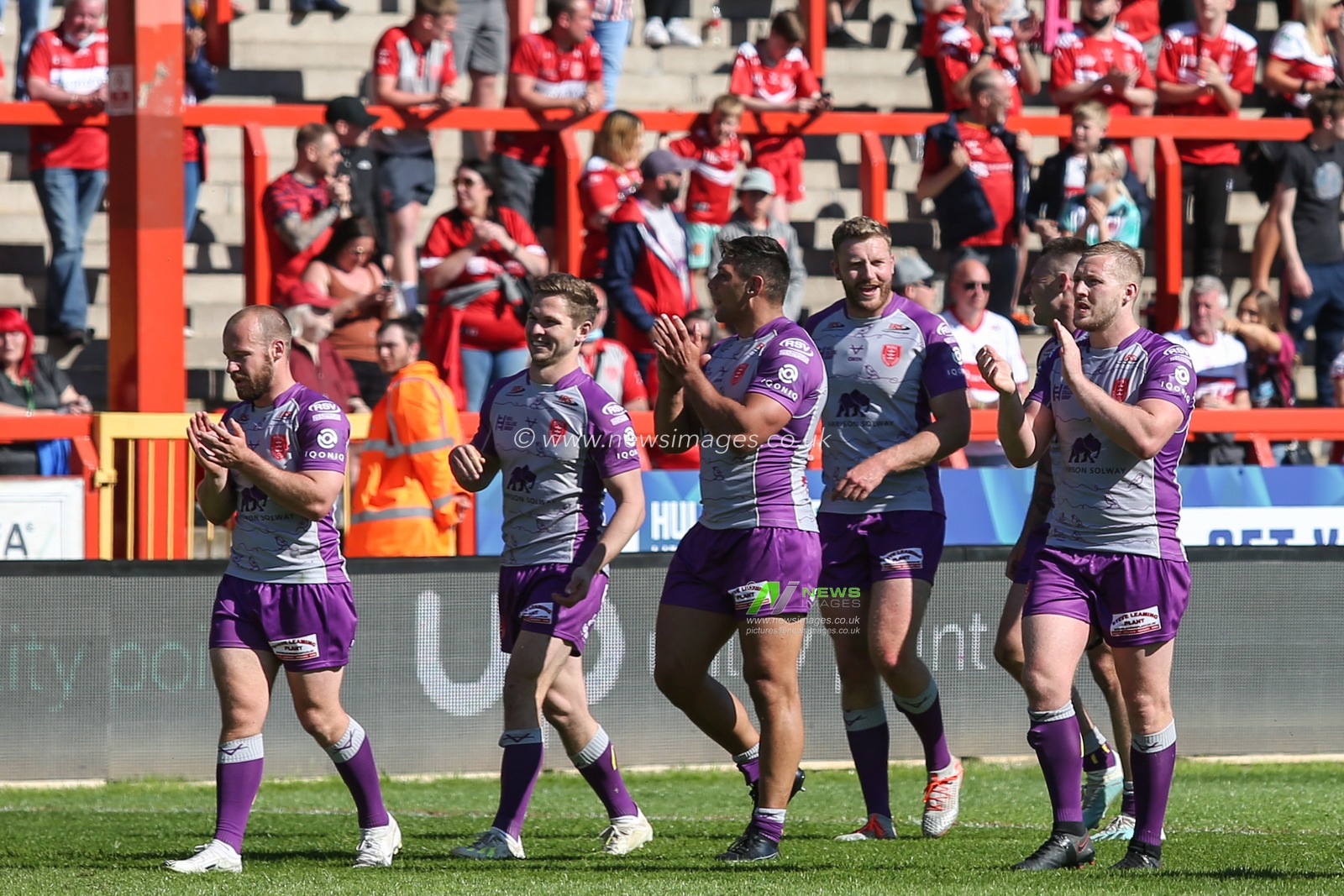 Hull KR players applaud the home fans
