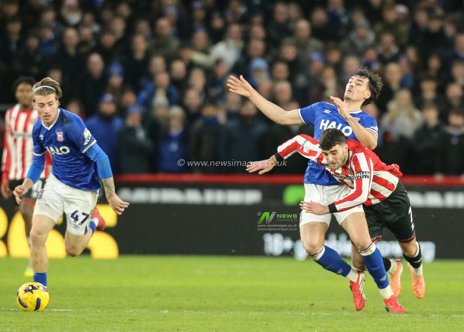 Thomas Cannon of Sheffield United is fouled by Jacob Greaves of Ipswich Town during the Sky Bet Championship match Sheffield United vs Ipswich Town at Bramall Lane, Sheffield, United Kingdom, 24th January 2026

(Photo by Richard Bierton/News Images)