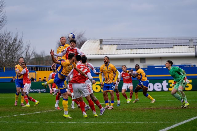 Christian Nørgaard of Arsenal leaps to head the ball away from Frazer Blake-Tracy of Mansfield Town during the Emirates FA Cup fifth round match Mansfield Town vs Arsenal at One Call Stadium, Mansfield, United Kingdom on 07 March 2026

(Photo by Maynard Manyowa/News Images)