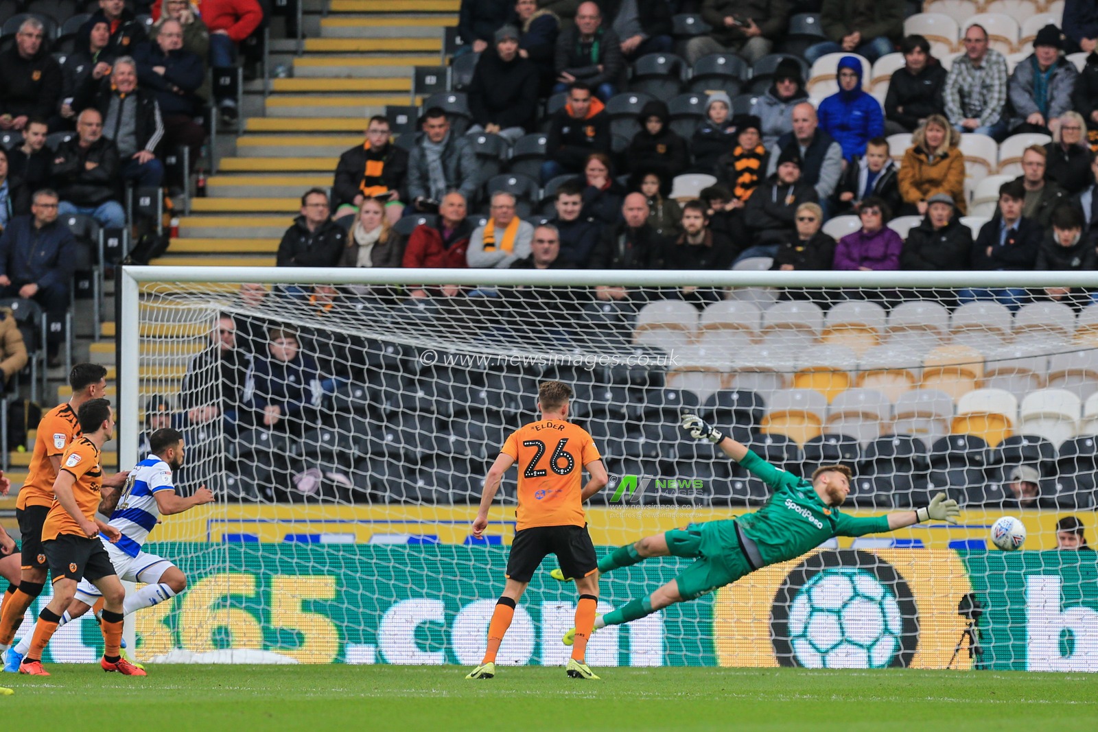 19th October 2019, KC Stadium, Kingston upon Hull, England; Sky Bet Championship, Hull City v Queens Park Rangers :Ryan Manning (14) of QPR scores past George Long  (1) of Hull City 

Credit: David Greaves/News Images