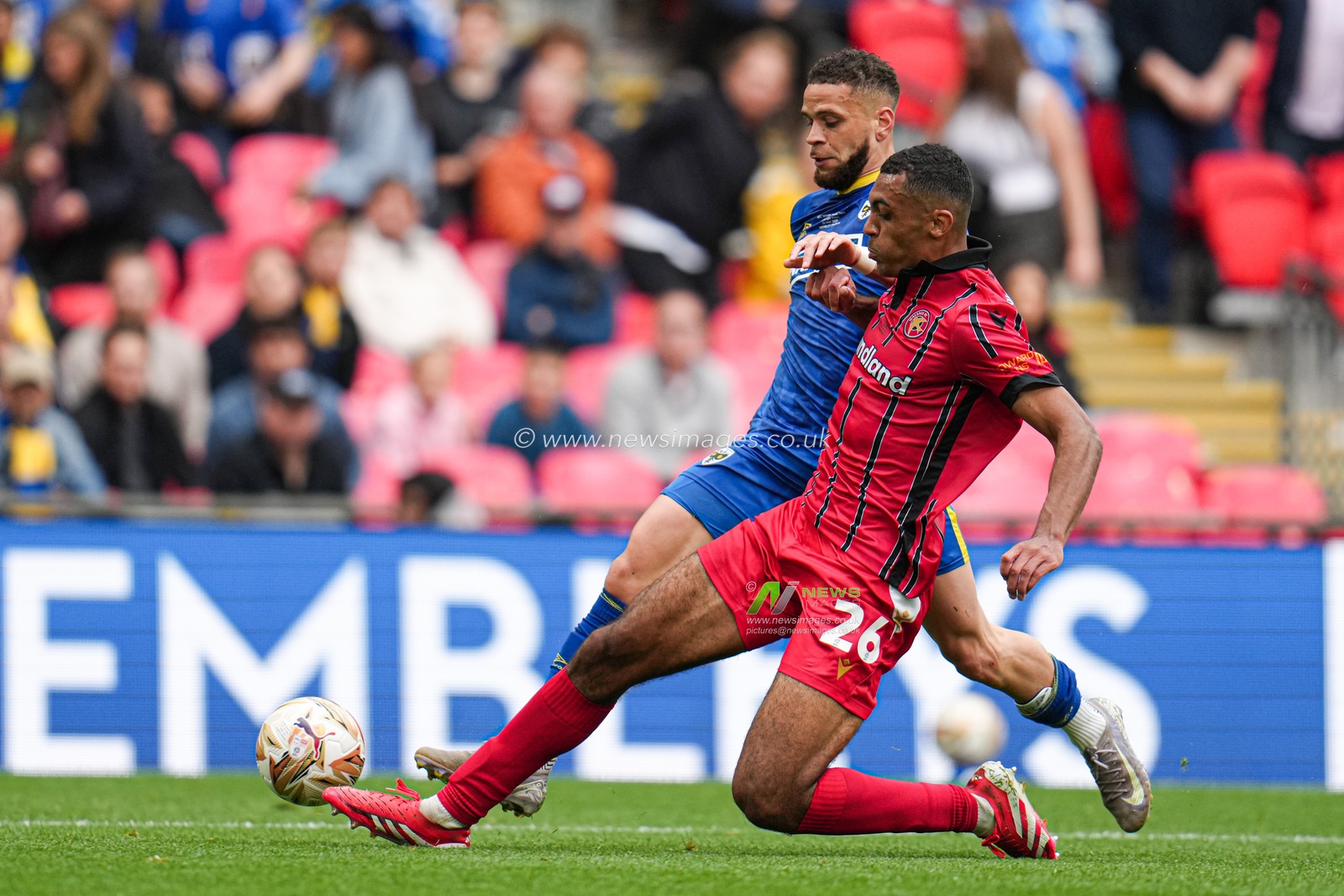 David Okagbue of Walsall makes crucial interception during the Sky Bet League 2 Playoff Final match AFC Wimbledon vs Walsall at Wembley Stadium, London, United Kingdom, 26th May 2025

(Photo by Harvey Murphy/News Images)