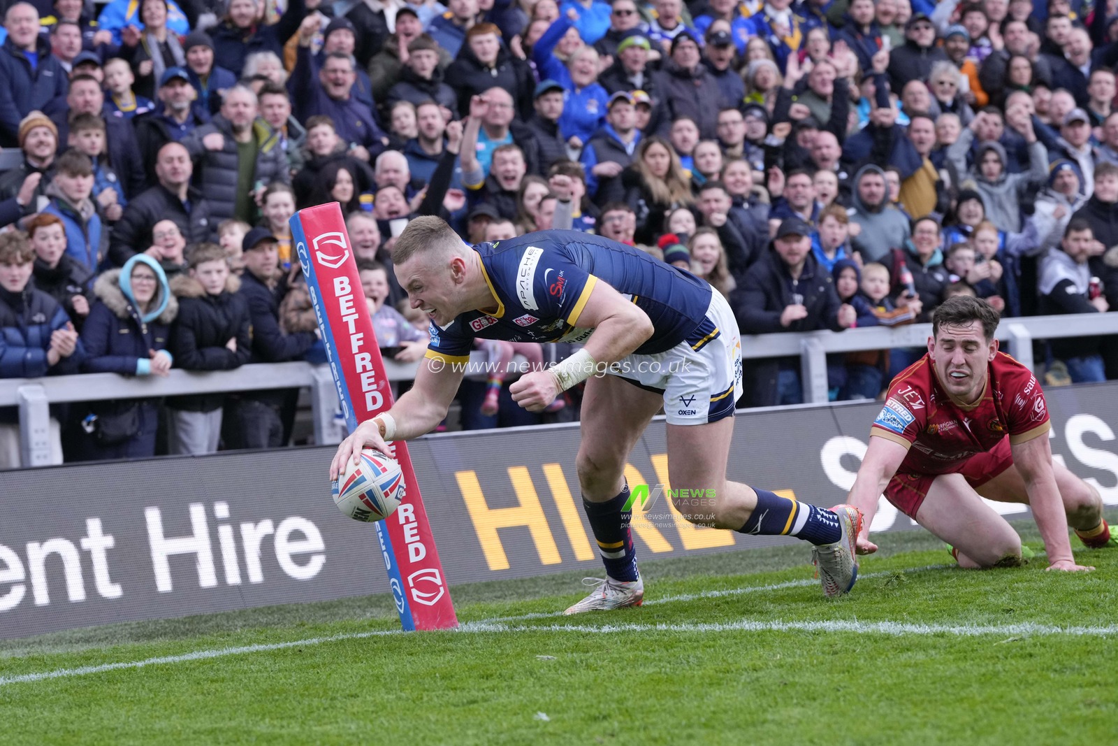 Matt Whitley #11 of Catalans Dragons pushes Harry Newman #3 of Leeds Rhinos enough for him to put a foot on the line to prevent a try during the Betfred Super League Round 6 match Leeds Rhinos vs Catalans Dragons at Headingley Stadium, Leeds, United Kingdom, 25th March 2023

(Photo by Steve Flynn/News Images)