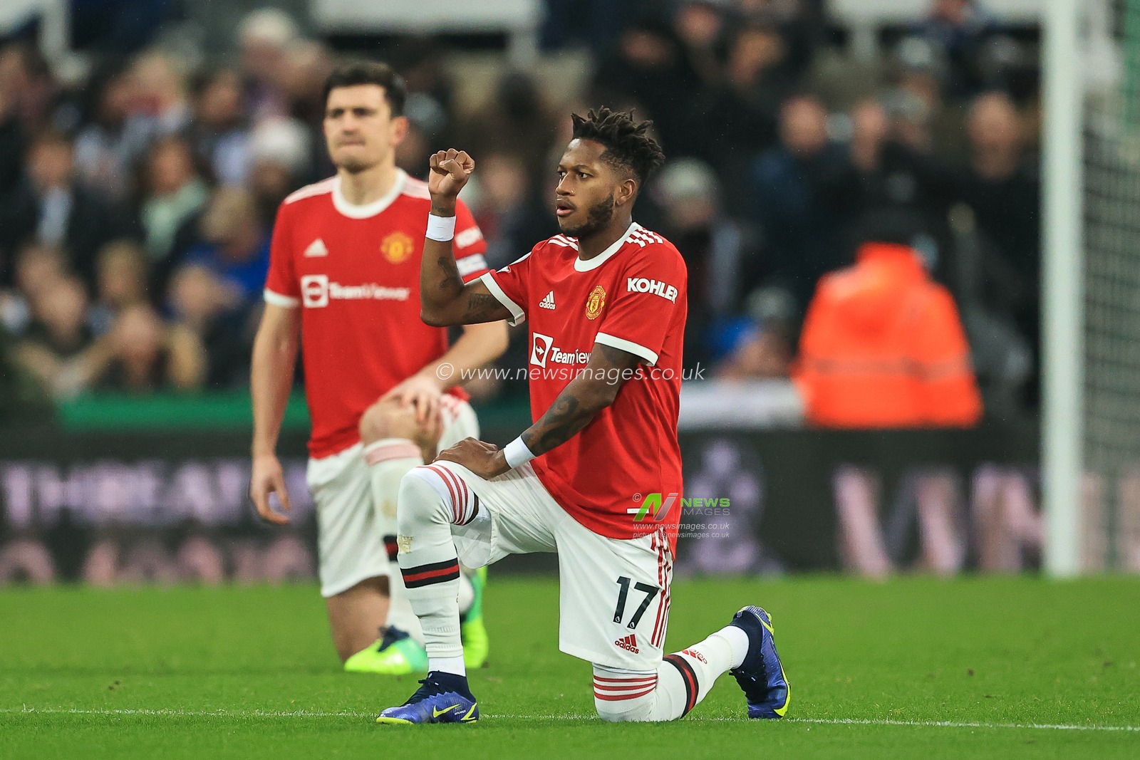 Fred #17 of Manchester United takes the knee