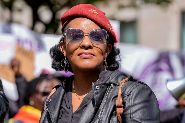 Development economist and activist Chenayi Mutambasere  looks on during Zimbabweans protest against the proposed constitution amendment at Embassy of Zimbabwe, London, United Kingdom on 18 April 2026

(Photo by Maynard Manyowa/News Images)