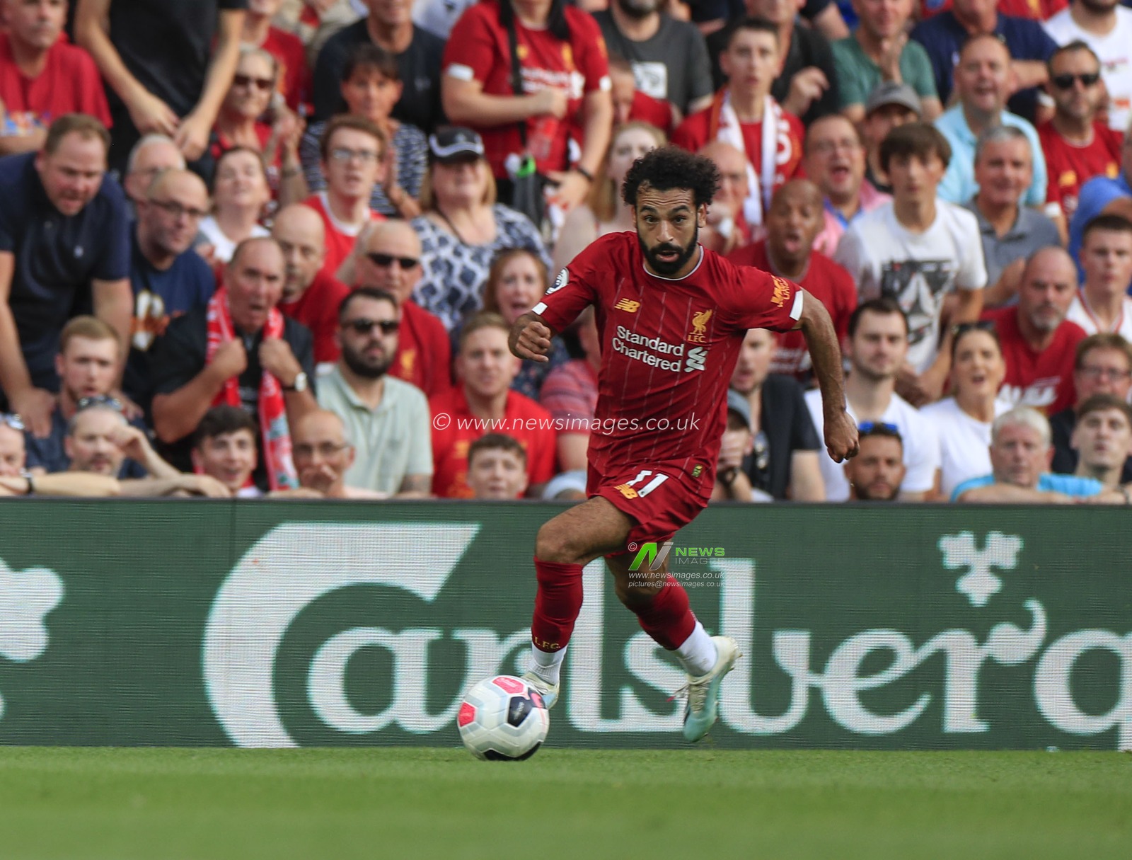 23rd August 2019 , Anfield, Liverpool, England; Premier League Football, Liverpool vs Arsenal ;  Mohamed Salah (11) of Liverpool makes a run down the wing

Credit: Conor Molloy/News Images 


Premier League/EFL Football images are subject to DataCo Licence