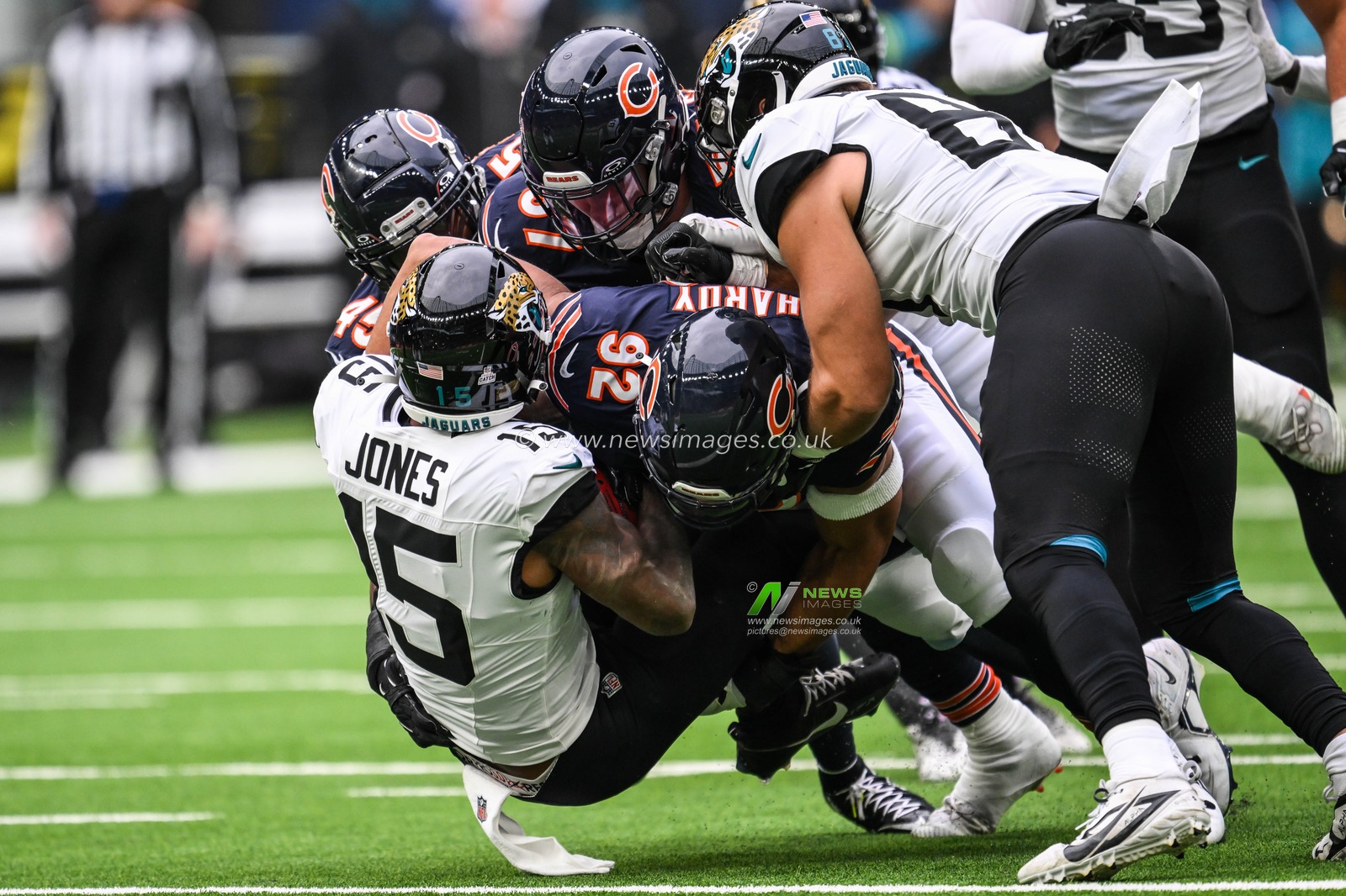 Tim Jones of the Jacksonville Jaguars is tackled by Daniel Hardy, Amen Ogbongbemiga and Jack Sanborn of the Chicago Bears during the Week 6 match Chicago Bears vs Jacksonville Jaguars at Tottenham Hotspur Stadium, London, United Kingdom, 13th October 2024

(Photo by Craig Thomas/News Images)