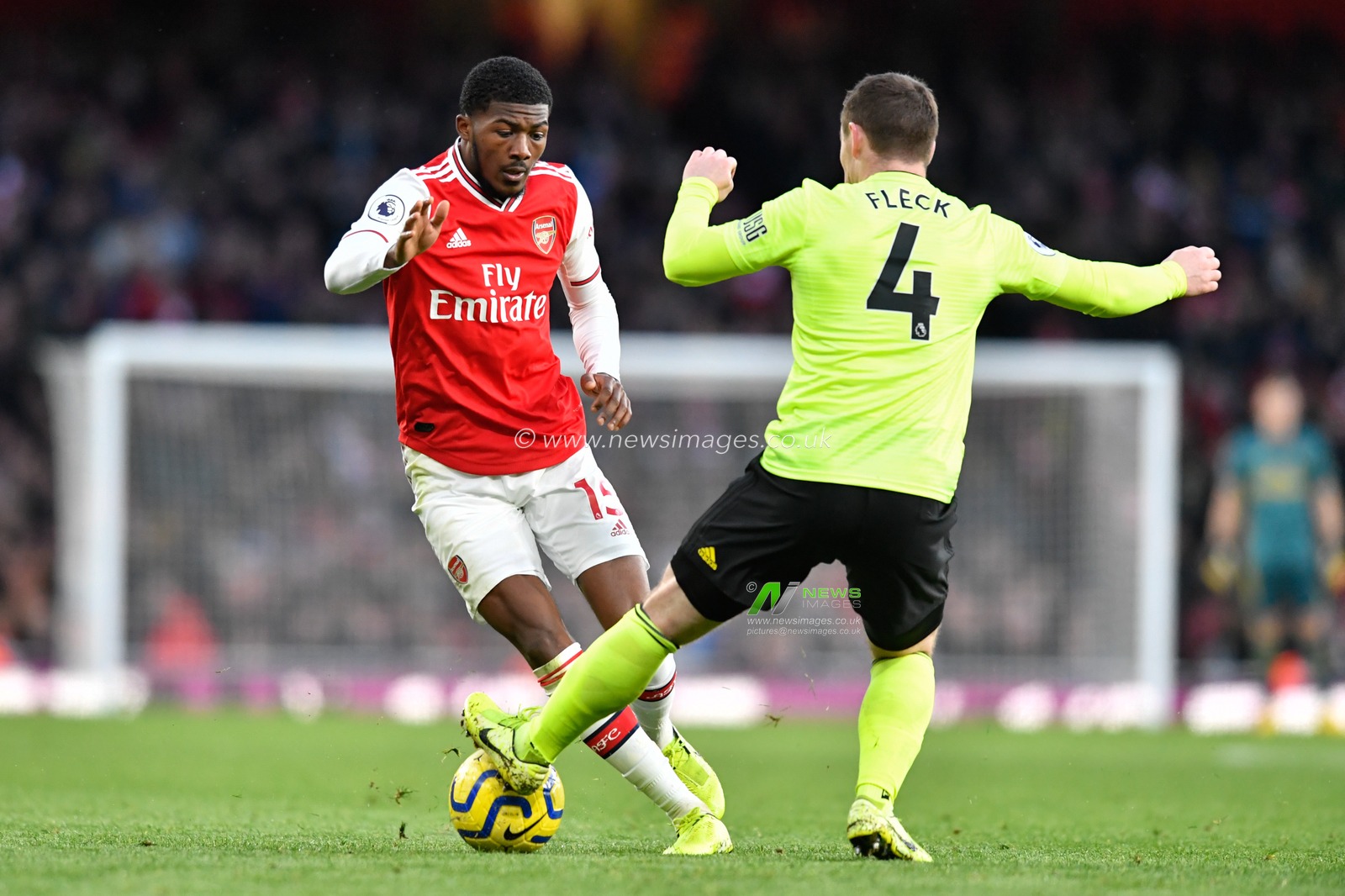18th January 2020, Emirates Stadium, London, England; Premier League, Arsenal v Sheffield United : John Fleck (4) of Sheffield United tackles Ainsley Maitland-Niles (15) of Arsenal

Credit: Simon Whitehead/News Images