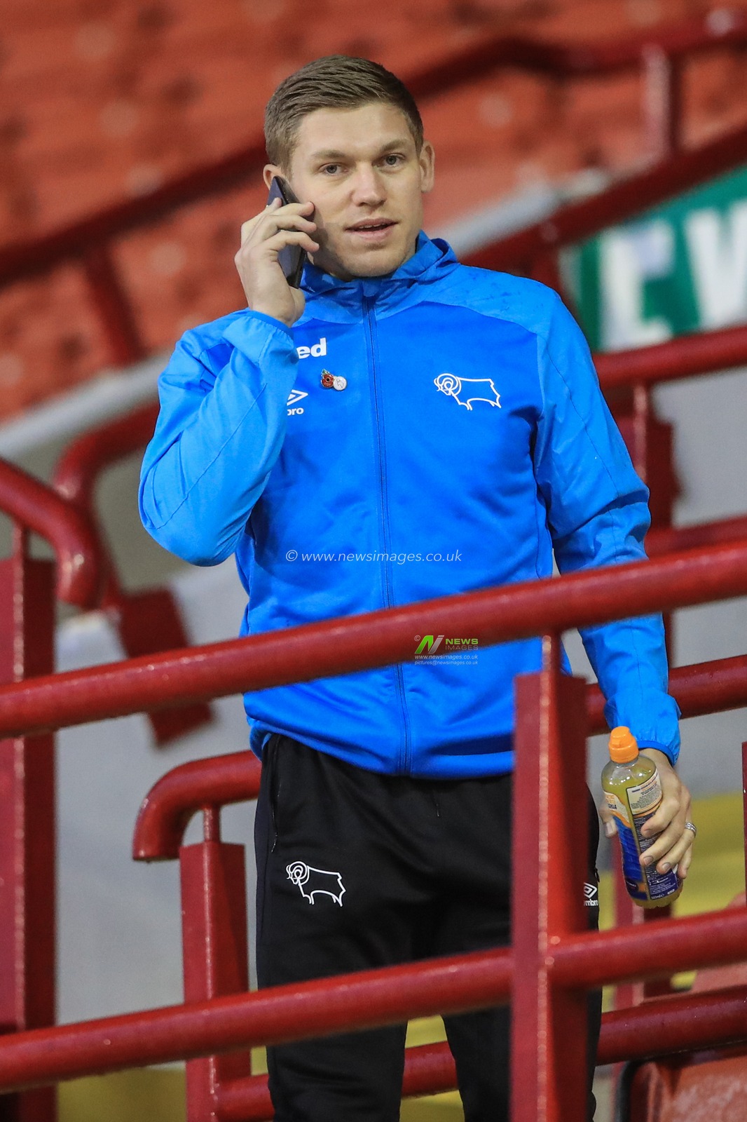 Martyn Waghorn #9 of Derby County up in the away stand as he makes a phone call
