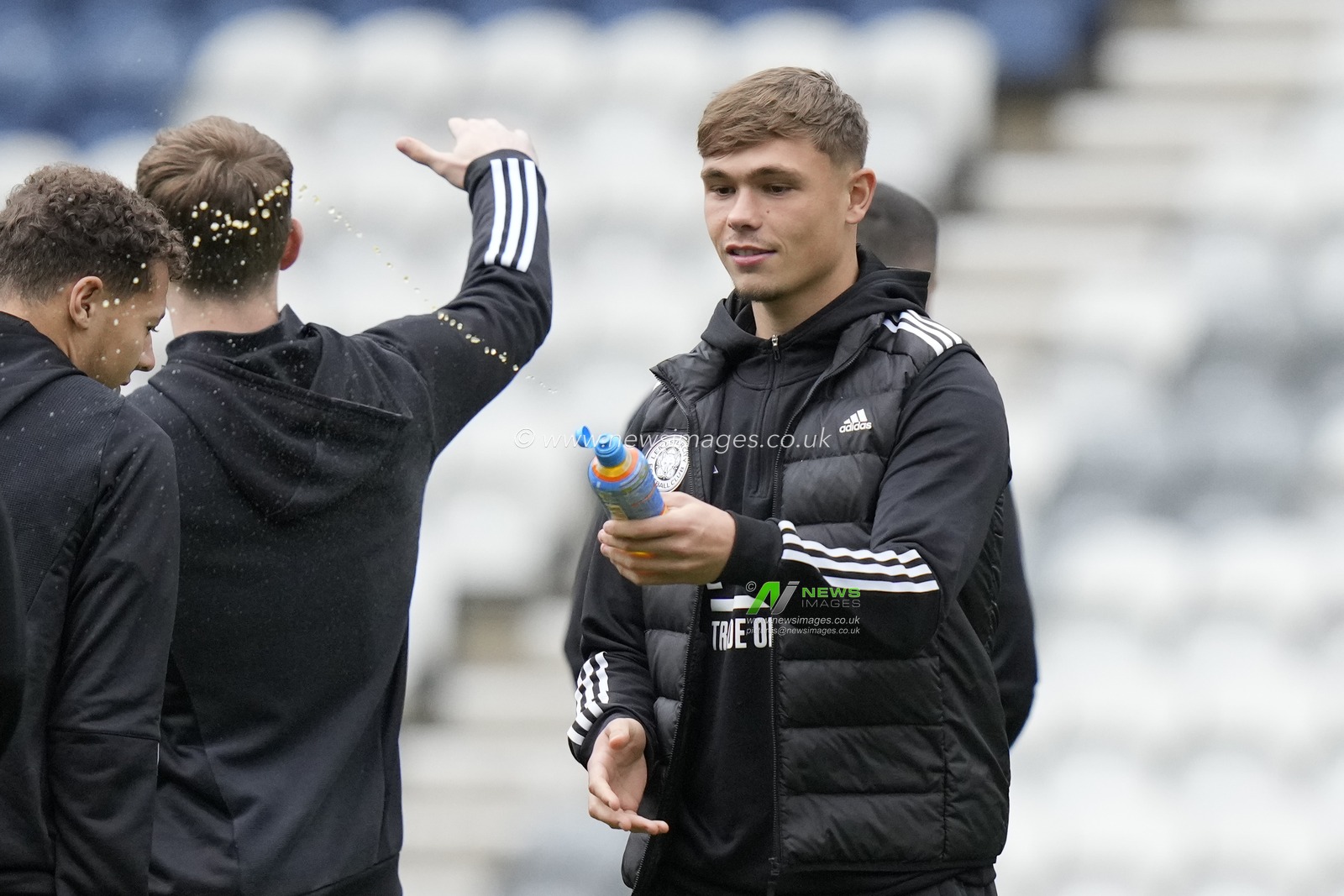 Callum Doyle of Leicester City squirts a drink while he inspects the pitch before the Sky Bet Championship match Preston North End vs Leicester City at Deepdale, Preston, United Kingdom, 29th April 2024

(Photo by Steve Flynn/News Images)