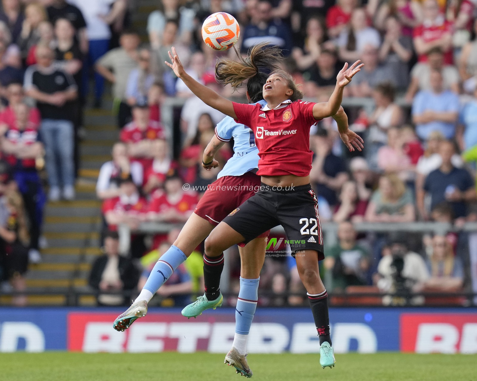 Nikita Parris #22 of Manchester United competes for a header during the The FA Women's Super League match Manchester United Women vs Manchester City Women at Leigh Sports Village, Leigh, United Kingdom, 21st May 2023

(Photo by Steve Flynn/News Images)