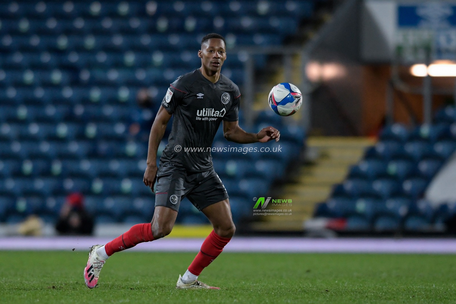 Ethan Pinnock #5 of Brentford looks to control the ball
