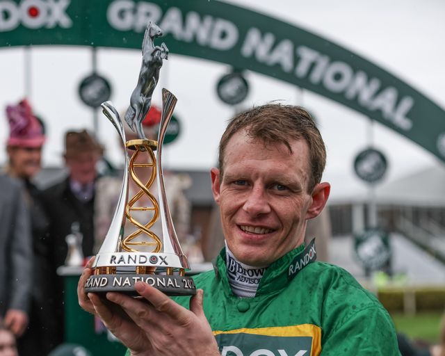 Paul Townend lifts the winner trophy as he wins the 16:00 Randox Grand National Handicap Chase on I Am Maximus during the Randox Grand National Day 2024 at Aintree Racecourse, Liverpool, United Kingdom, 13th April 2024

(Photo by Mark Cosgrove/News Images)