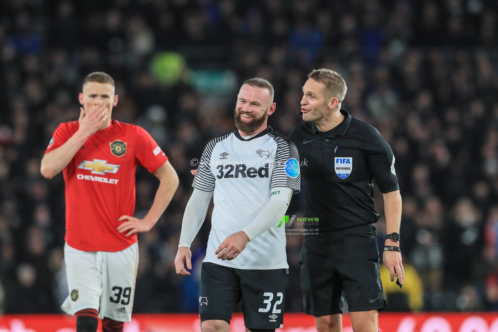 5th March 2020, Pride Park Stadium, Derby, England; Emirates FA Cup 5th Round, Derby County v Manchester United : Wayne Rooney (32) of Derby County laughs with referee Craig Pawson