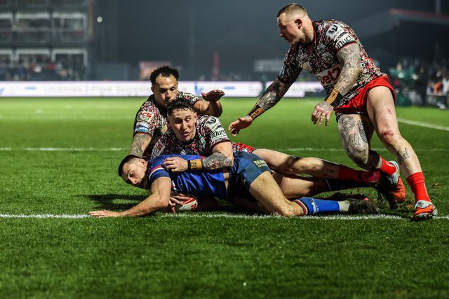 Oliver Pratt of Wakefield Trinity goes over for a try during the Betfred Super League round 5 match Wakefield Trinity vs Leigh Leopards at DIY Kitchens Stadium, Wakefield, United Kingdom on 20 March 2026

(Photo by Alfie Cosgrove/News Images)