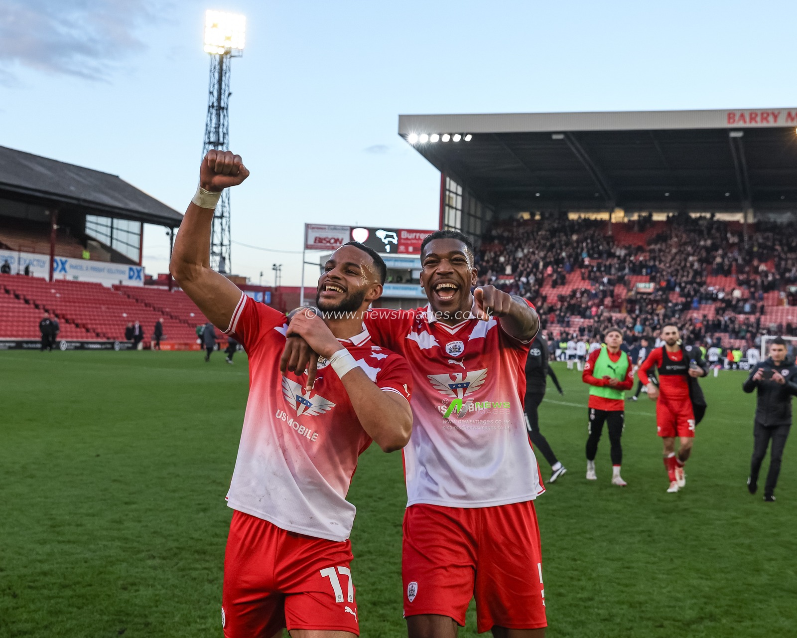 Barry Cotter of Barnsley and Donovan Pines of Barnsley celebrate their 2-1 win during the Sky Bet League 1 match Barnsley vs Derby County at Oakwell, Barnsley, United Kingdom, 24th February 2024

(Photo by Mark Cosgrove/News Images)