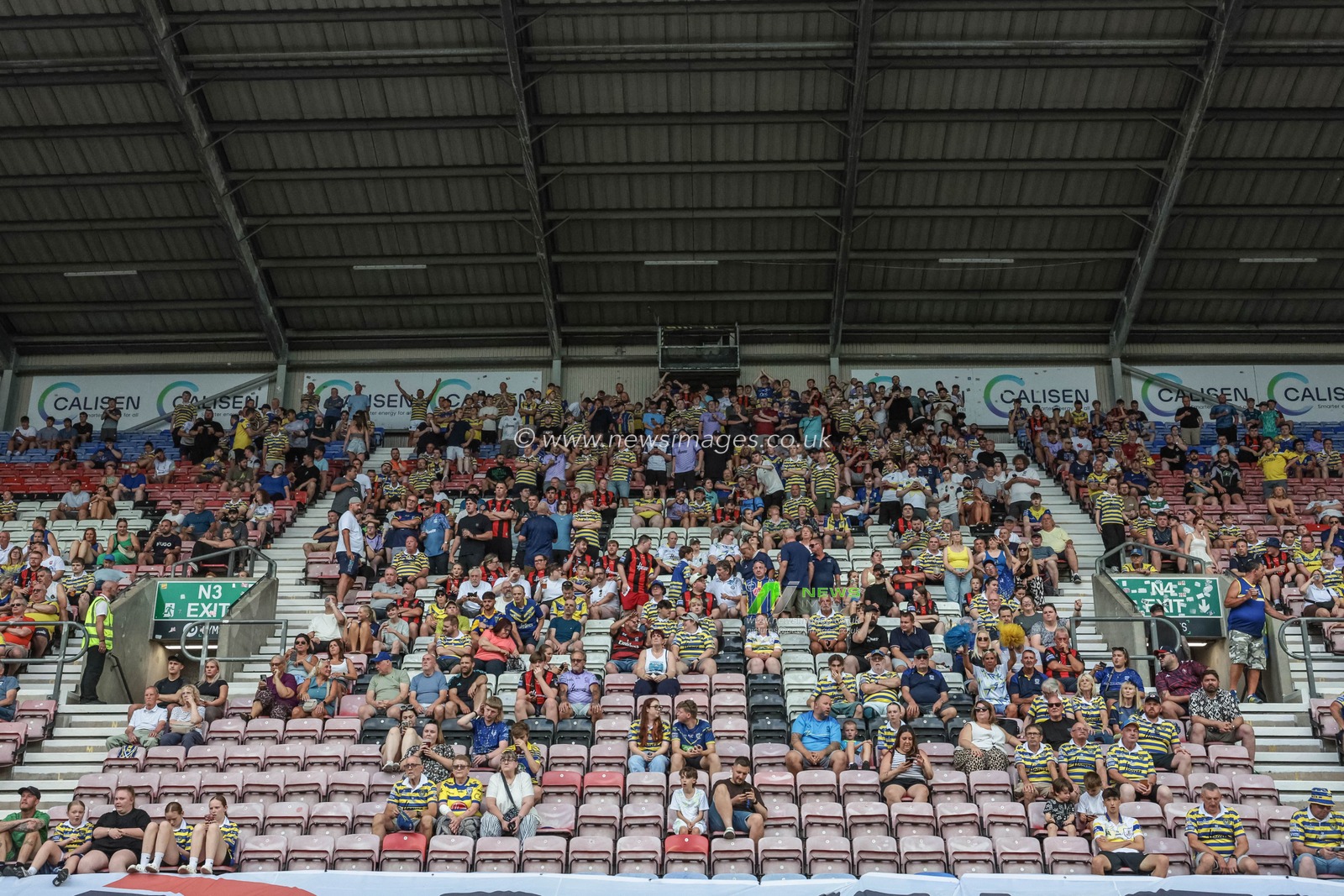 Warrington fans take to their seats during the Betfred Super League round 18 match Wigan Warriors vs Warrington Wolves at The Brick Community Stadium, Wigan, United Kingdom on 10 July 2026

(Photo by Mark Cosgrove/News Images)
