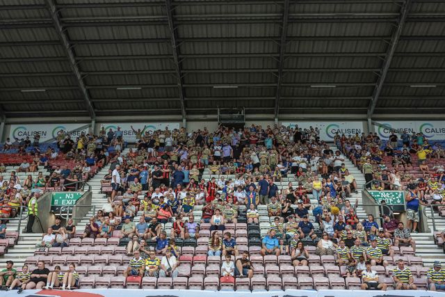 Warrington fans take to their seats during the Betfred Super League round 18 match Wigan Warriors vs Warrington Wolves at The Brick Community Stadium, Wigan, United Kingdom on 10 July 2026

(Photo by Mark Cosgrove/News Images)