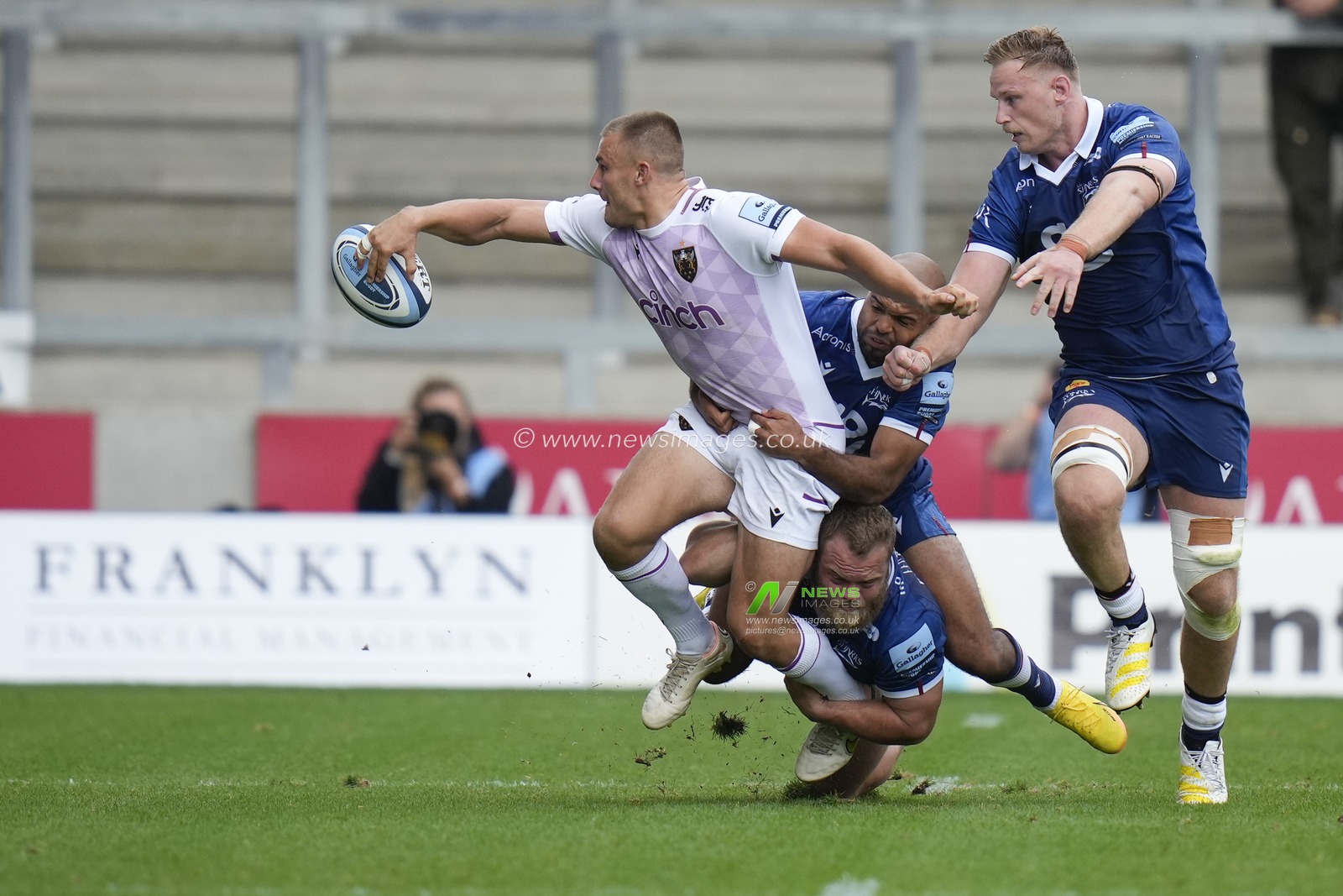 Northampton Saints Ollie Sleightholme offloads the ball during the Gallagher Premiership match Sale Sharks vs Northampton Saints at AJ Bell Stadium, Eccles, United Kingdom, 11th September 2022

(Photo by Steve Flynn/News Images)