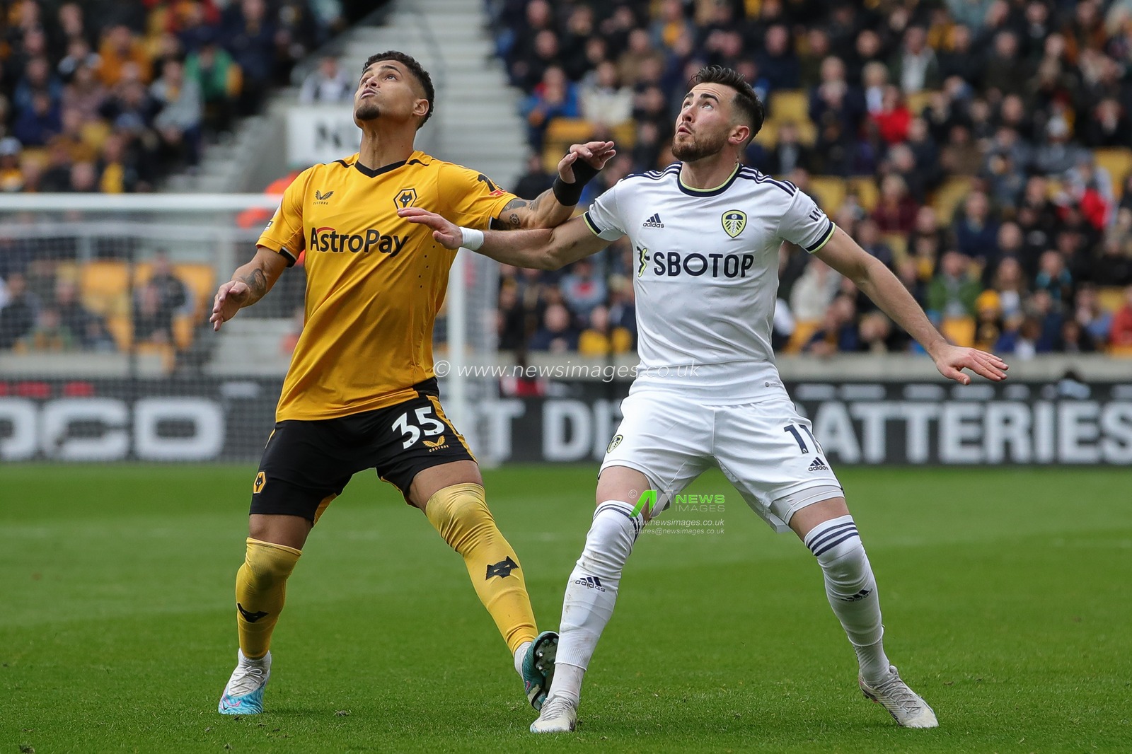 Jack Harrison #11 of Leeds United and JoÃ£o Gomes #35 of Wolverhampton Wanderers battle for the ball during the Premier League match Wolverhampton Wanderers vs Leeds United at Molineux, Wolverhampton, United Kingdom, 18th March 2023

(Photo by James Heaton/News Images)