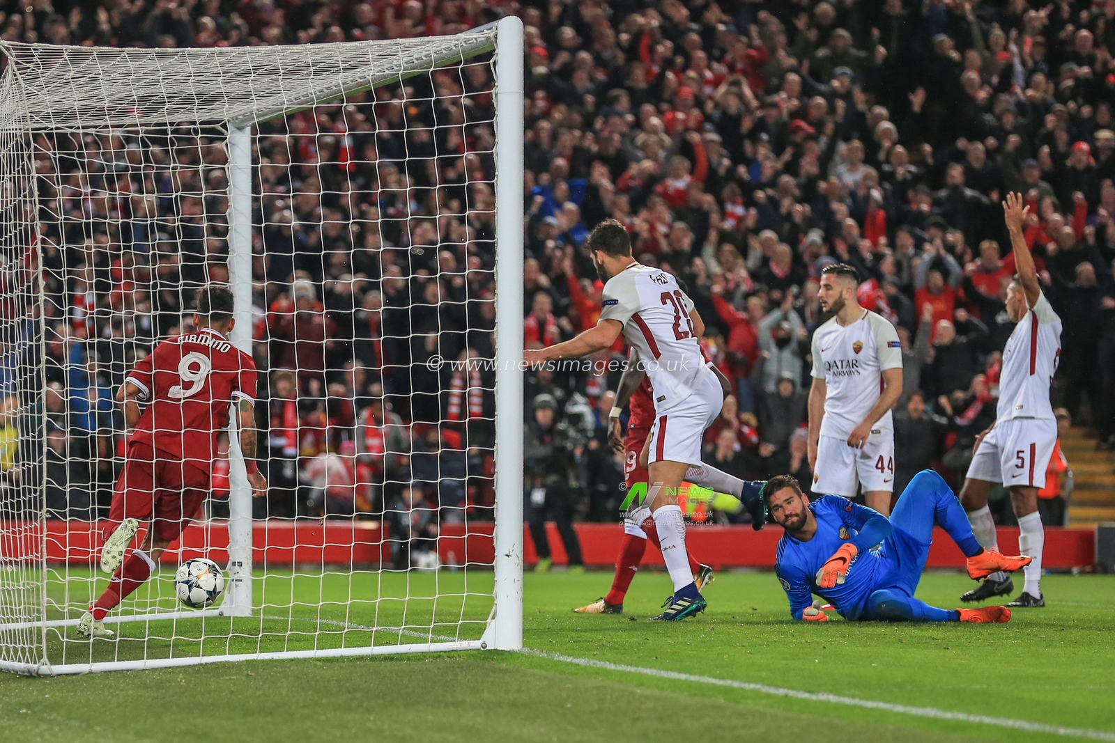 24th April 2018 , Anfield, Liverpool, England; UAFA Champions League Semi Final, first leg, Liverpool v Roma ; Alisson Becker of Roma looks on as Roberto Firmino of Liverpool finds the back of the net