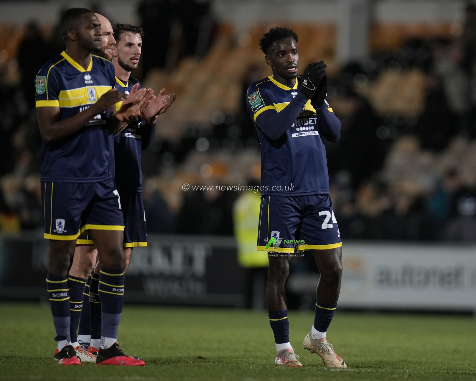 Alex Bangura #24 of Middlesbroughsalutes the fans after the Carabao Cup Quarter Final match Port Vale vs Middlesbrough at Vale Park, Burslem, United Kingdom, 19th December 2023

(Photo by Steve Flynn/News Images)