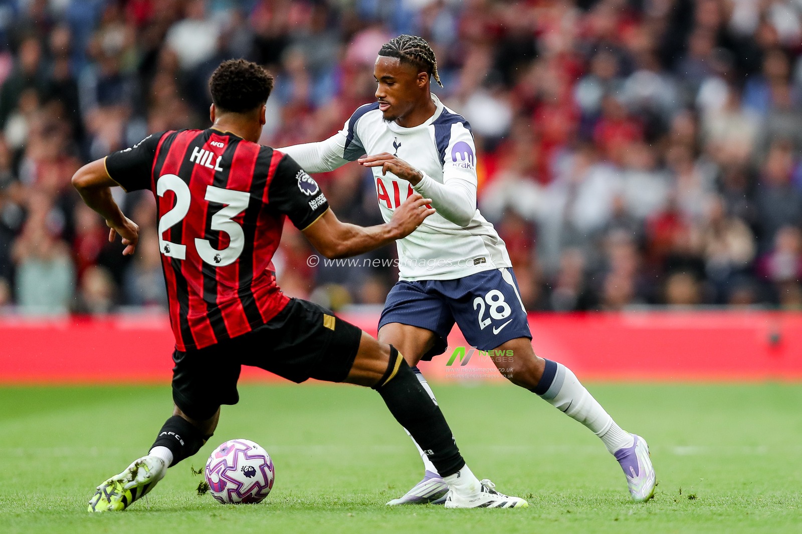 Wilson Odobert of Tottenham Hotspur is put under pressure by James Hill of AFC Bournemouth during the Premier League match Tottenham Hotspur vs Bournemouth at Tottenham Hotspur Stadium, London, United Kingdom, 30th August 2025

(Photo by Izzy Poles/News Images)