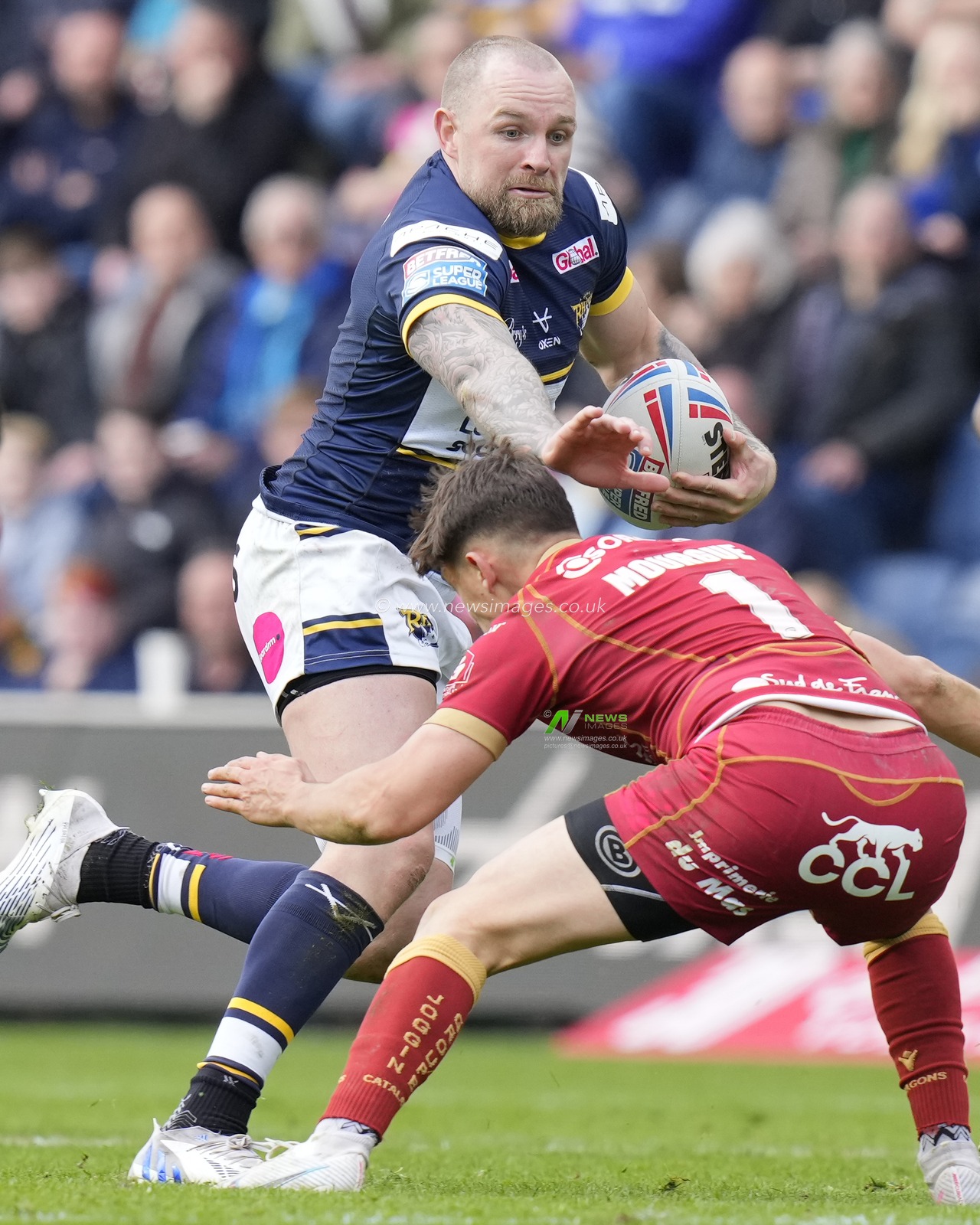 Blake Austin #6 of Leeds Rhinos makes a break during the Betfred Super League Round 6 match Leeds Rhinos vs Catalans Dragons at Headingley Stadium, Leeds, United Kingdom, 25th March 2023

(Photo by Steve Flynn/News Images)