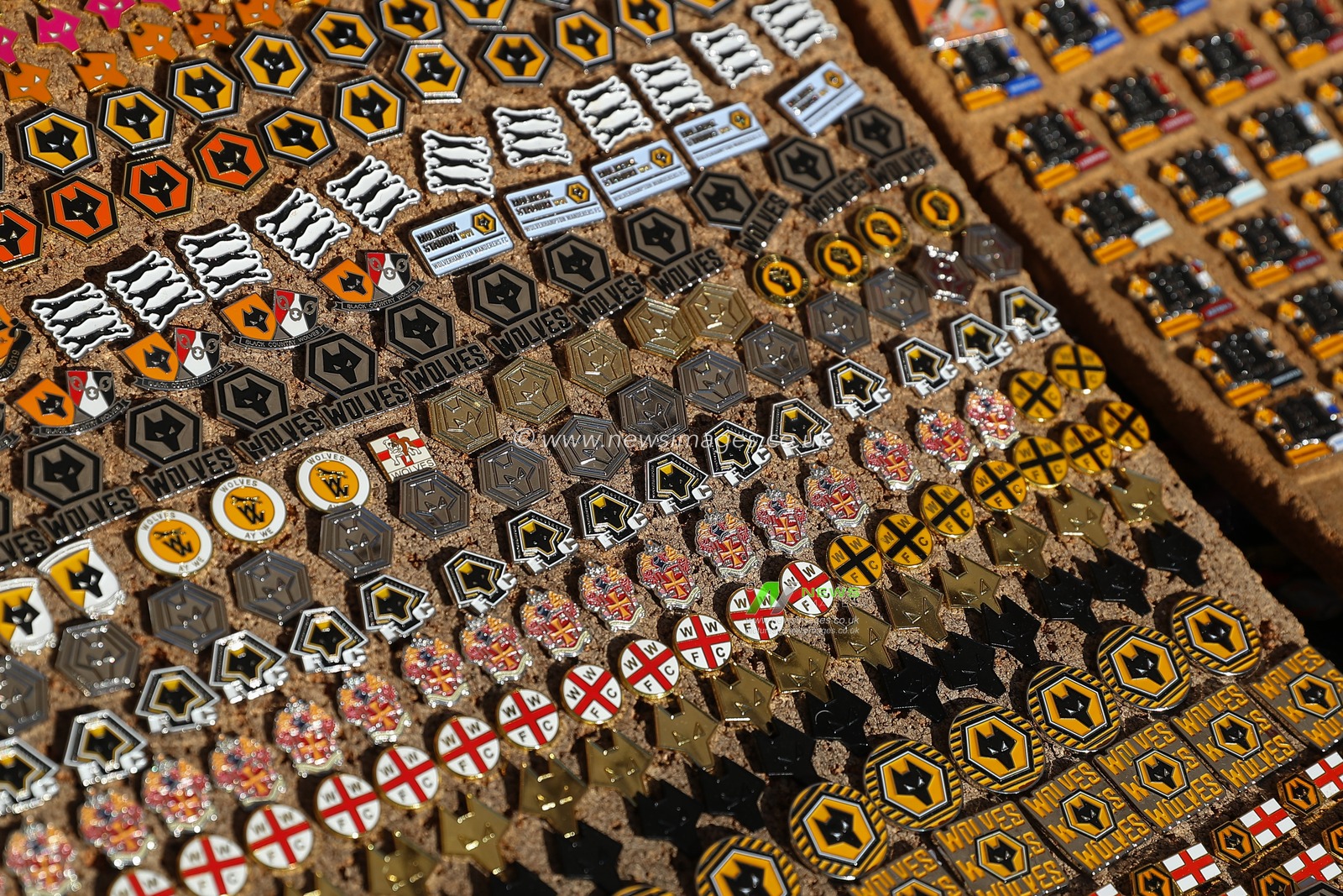A stall selling pin badges outside of the stadium ahead of the Premier League match Wolverhampton Wanderers vs Tottenham Hotspur at Molineux, Wolverhampton, United Kingdom, 11th November 2023

(Photo by Gareth Evans/News Images)