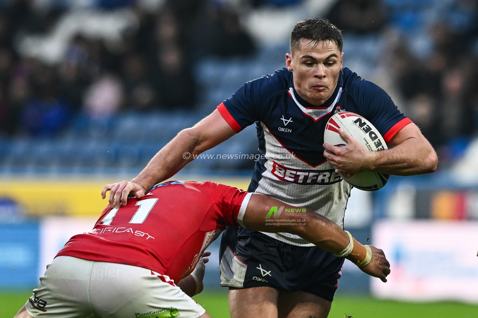 Jack Welsby of England is tackled by Tyson Frizell of Tonga during the Rugby League International match England vs Tonga at John Smith's Stadium, Huddersfield, United Kingdom, 28th October 2023

(Photo by Craig Thomas/News Images)
