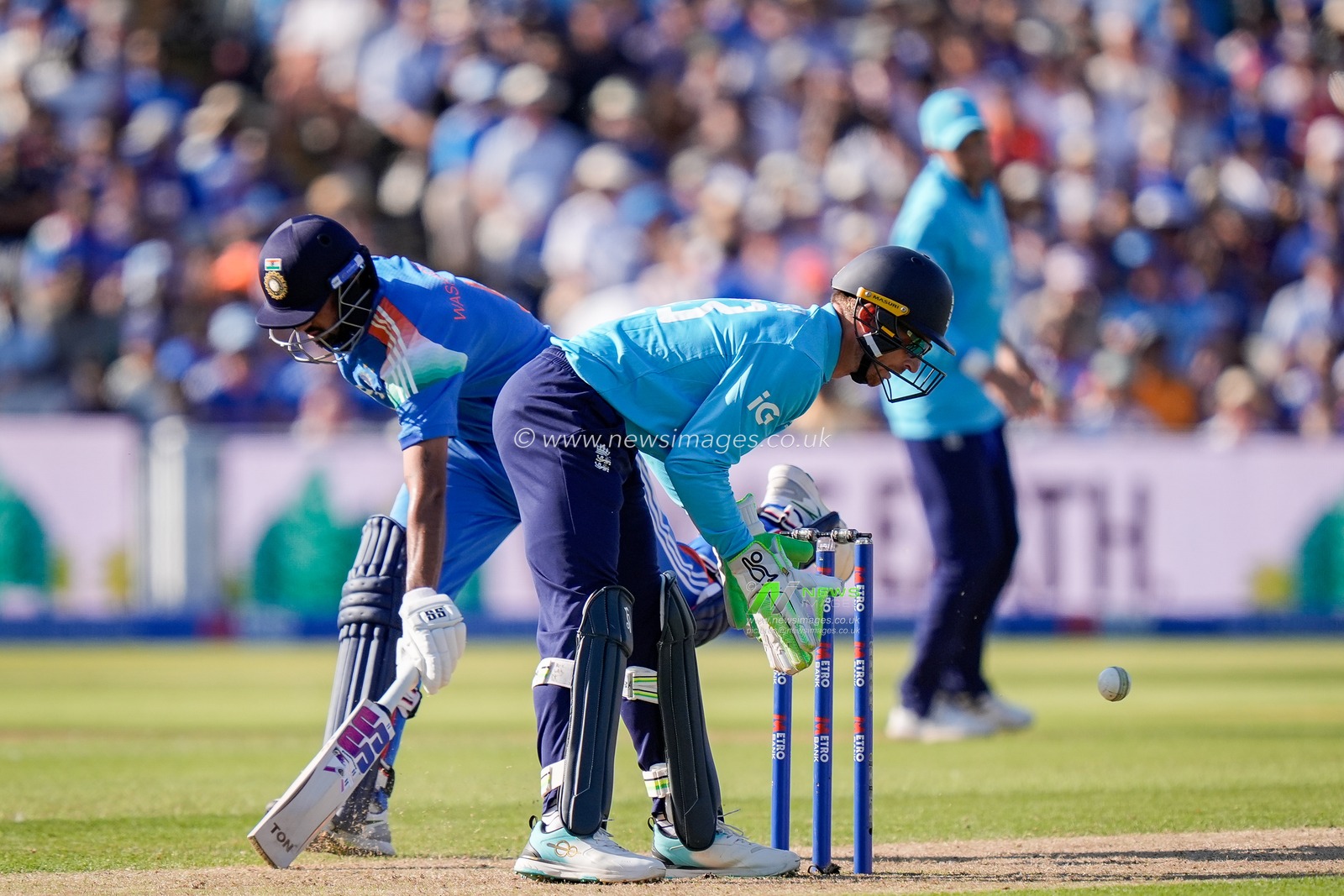 Jos Buttler of England attempts to run Washington Sundar of India out during the 1st Metro Bank ODI match England vs India at Edgbaston, Birmingham, United Kingdom on 14 July 2026

(Photo by Maynard Manyowa/News Images)