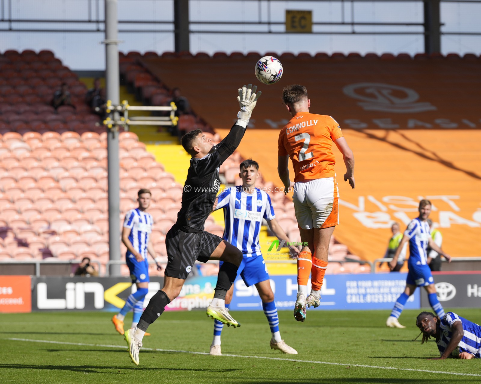 Sam Tickle #1 of Wigan Athletic competes for a cross with Callum Connolly #2 of Blackpool during the Sky Bet League 1 match Blackpool vs Wigan Athletic at Bloomfield Road, Blackpool, United Kingdom, 2nd September 2023

(Photo by Steve Flynn/News Images)