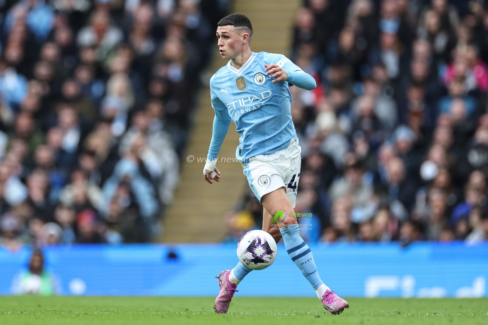 Phil Foden of Manchester City with the ball during the Premier League match Manchester City vs Manchester United at Etihad Stadium, Manchester, United Kingdom, 3rd March 2024

(Photo by Mark Cosgrove/News Images)